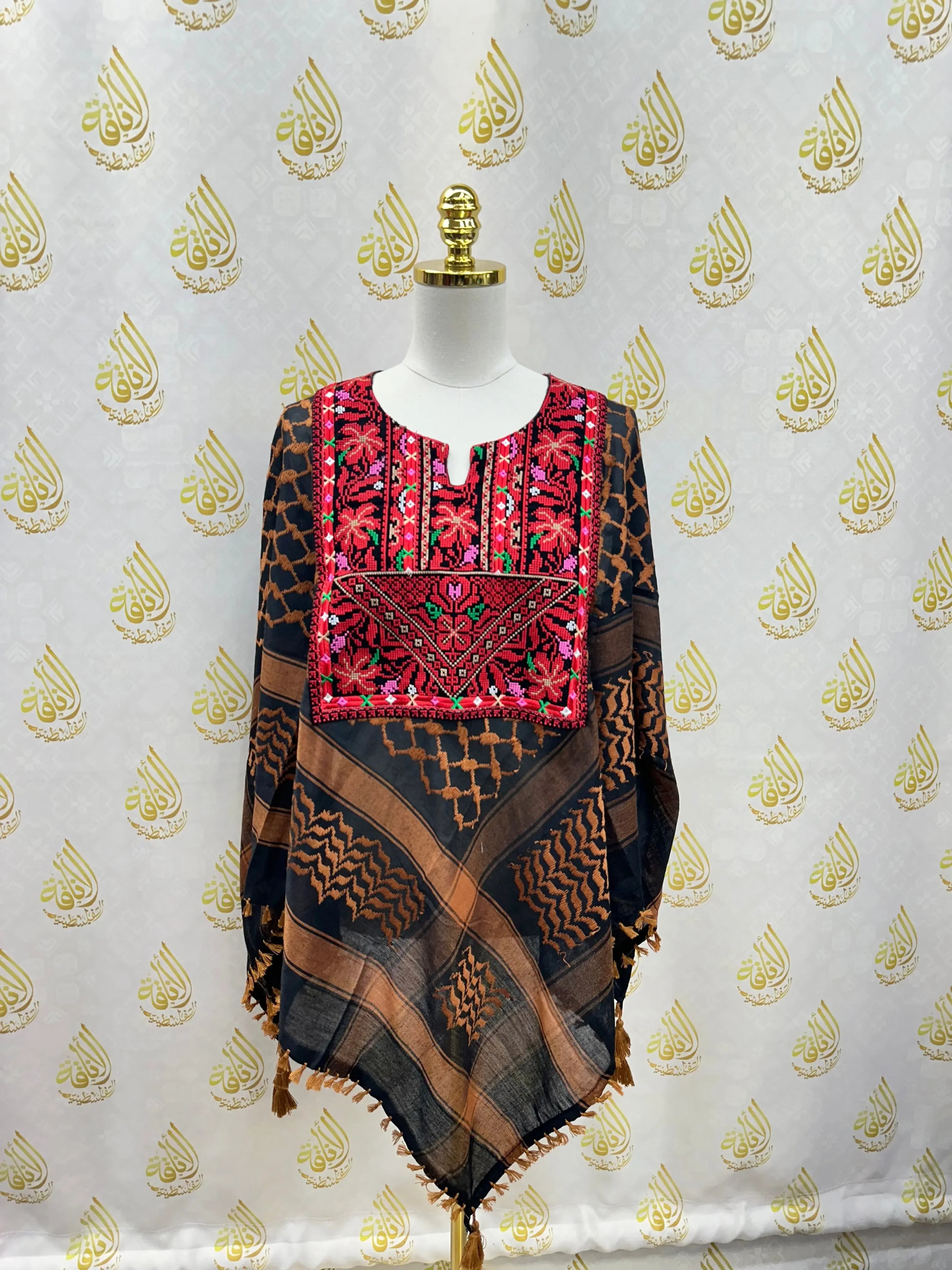 Palestinian Elegance casual multicolor kuffiyeh shirt with embroidered pink chest panel on mannequin