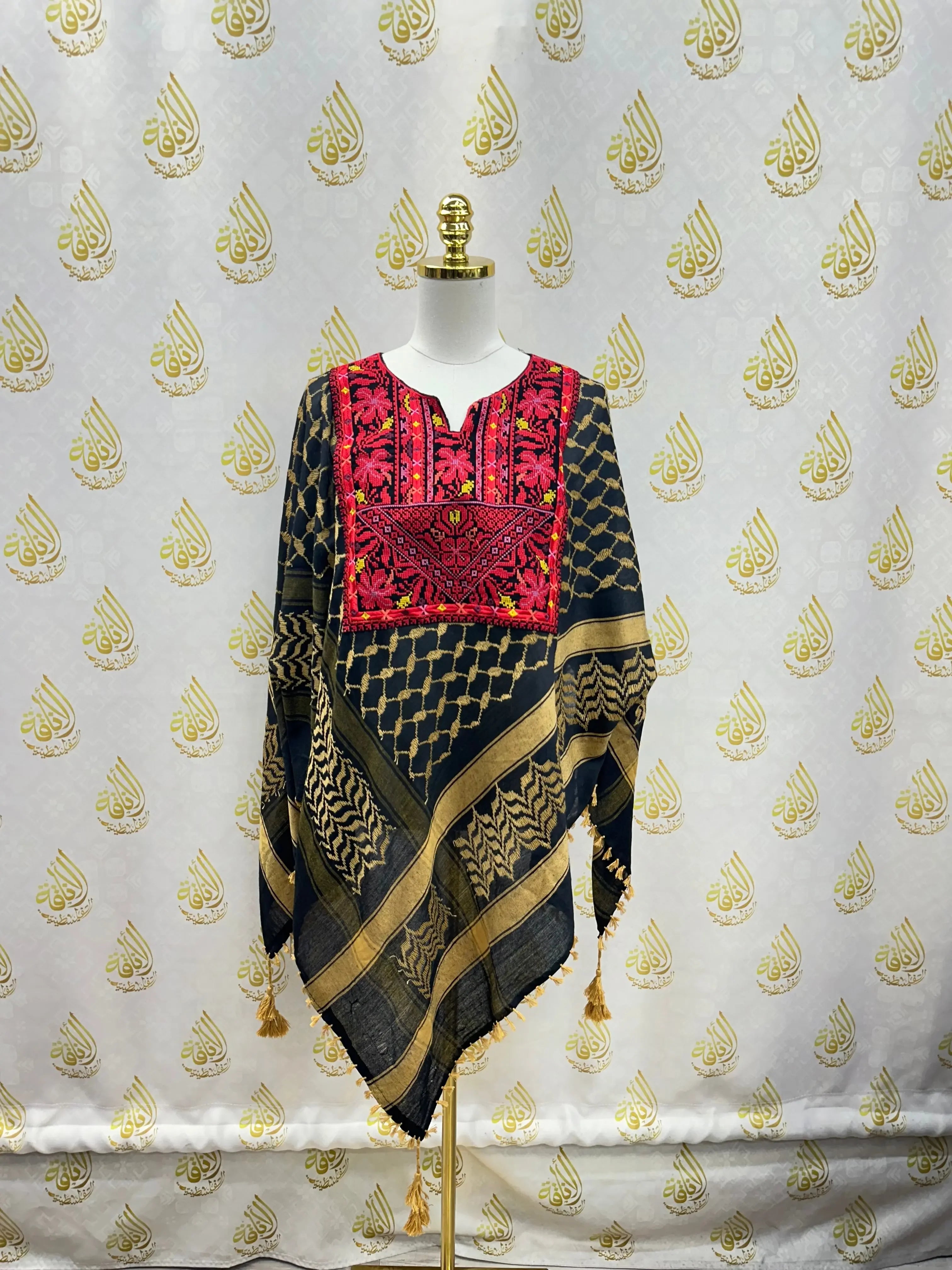 Palestinian Elegance multicolor kuffiyeh shirt with traditional embroidery on black and gold patterned fabric