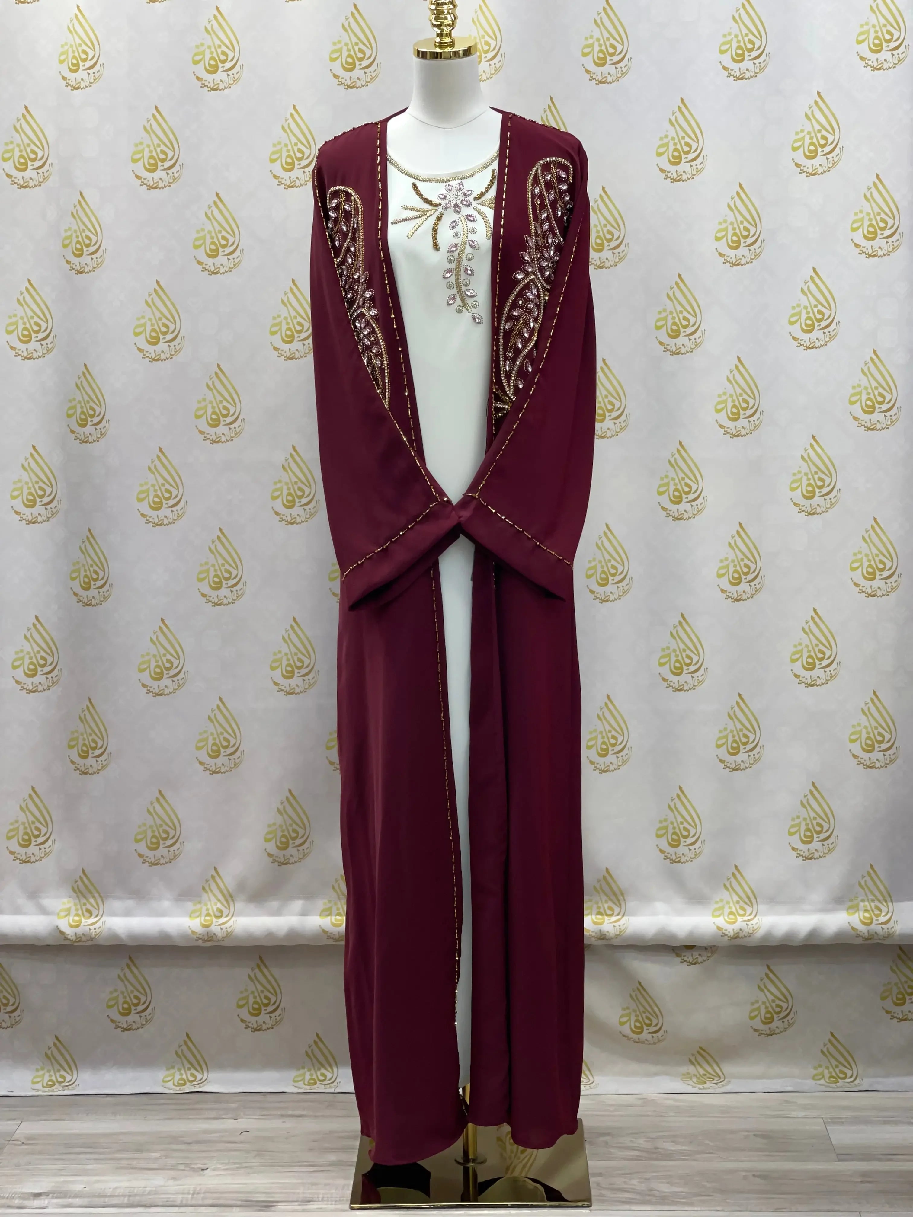 Palestinian Elegance open abaya set in deep maroon with intricate embroidery on front panels