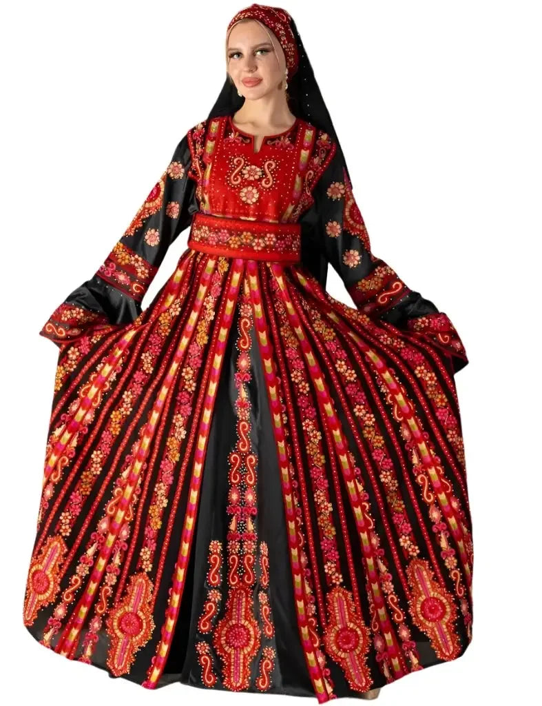 Palestinian bridal thoub dress with intricate red and black embroidery by Palestinian Elegance