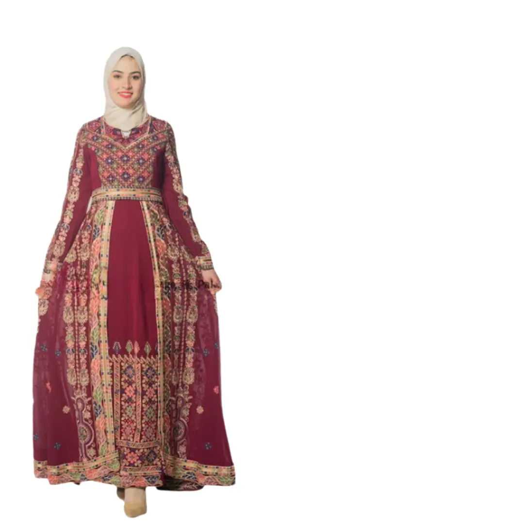 Woman wearing a maroon embroidered Palestinian dress with intricate colorful embroidery and long sleeves