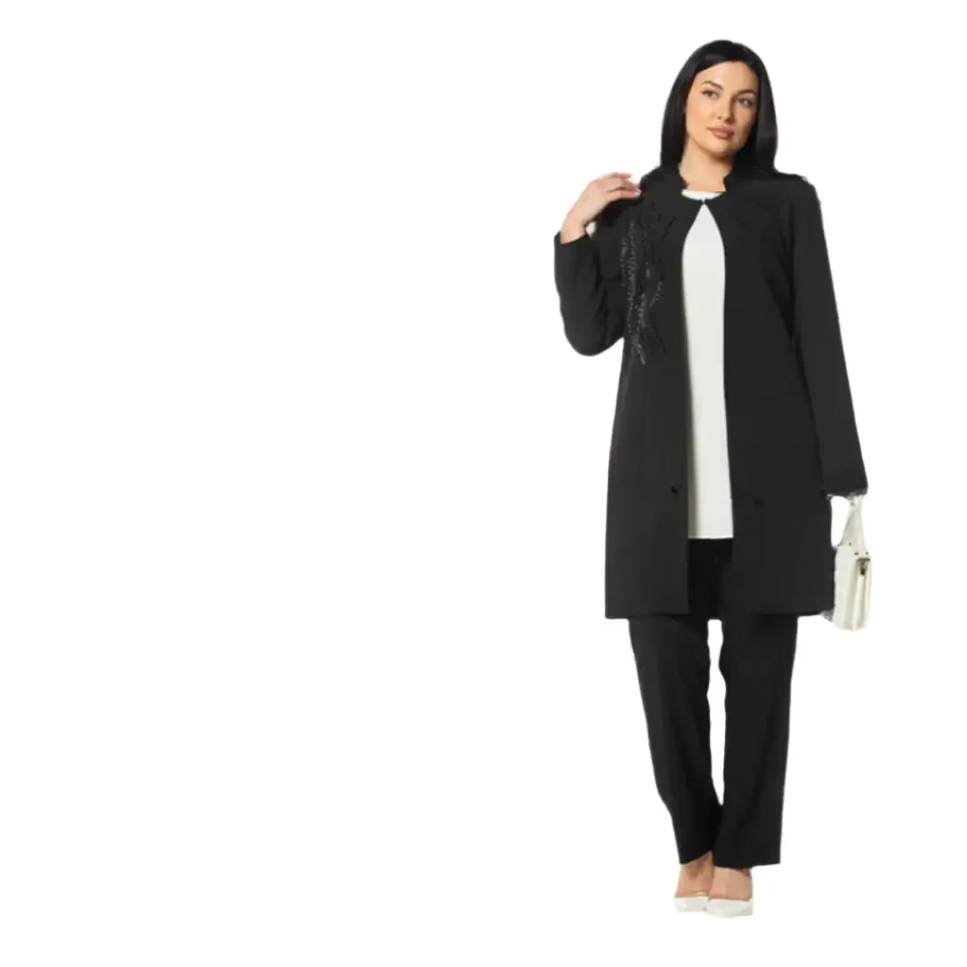 Palestinian Elegance luxury formal three piece suit in black worn by woman with white blouse and heels