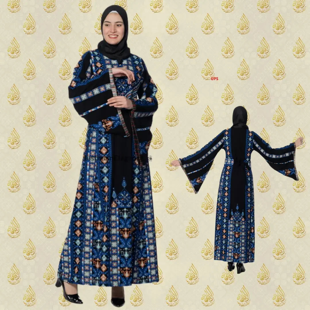 Palestinian embroidered dress by Palestinian Elegance featuring intricate blue and black traditional embroidery with wide sleeves