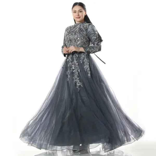 Palestinian embroidered dress by Palestinian Elegance with intricate silver floral embroidery and flowing tulle skirt
