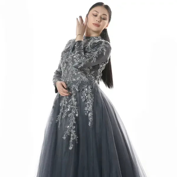 Elegant gray Palestinian embroidered dress with intricate silver floral detailing and long sleeves