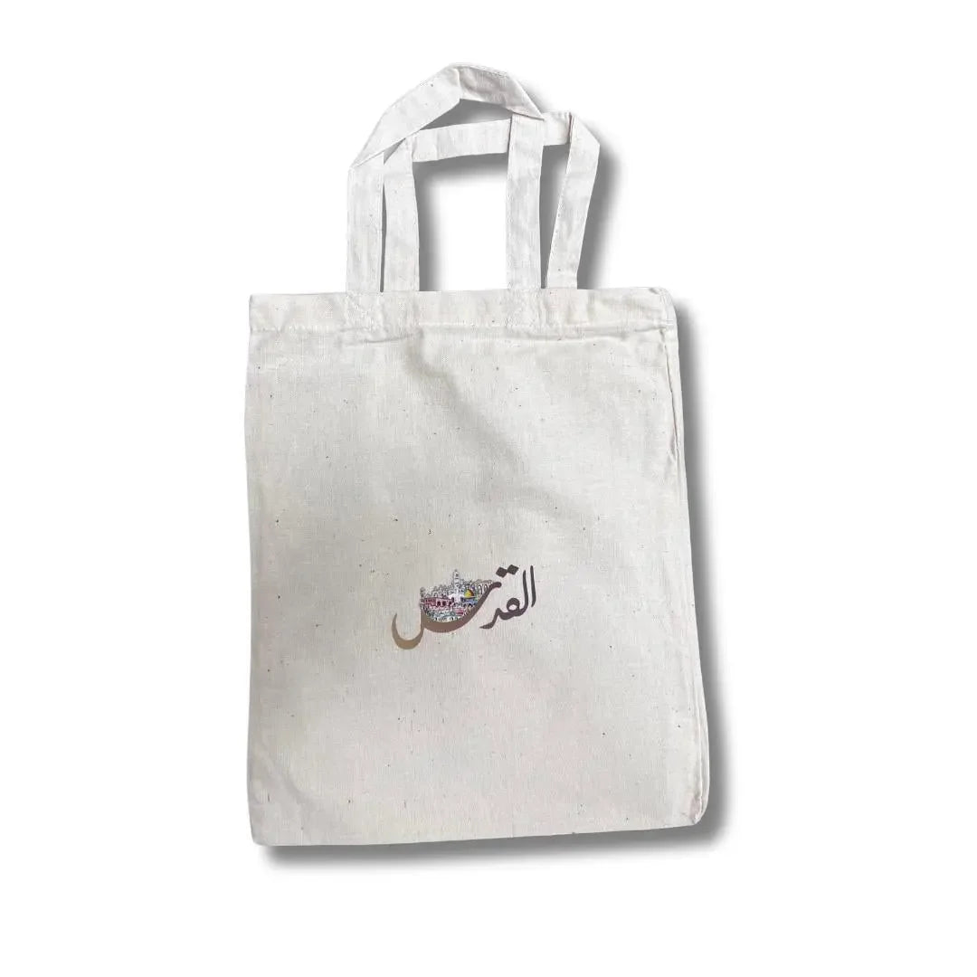 Palestinian embroidered handbag in white fabric tote style with Arabic calligraphy design