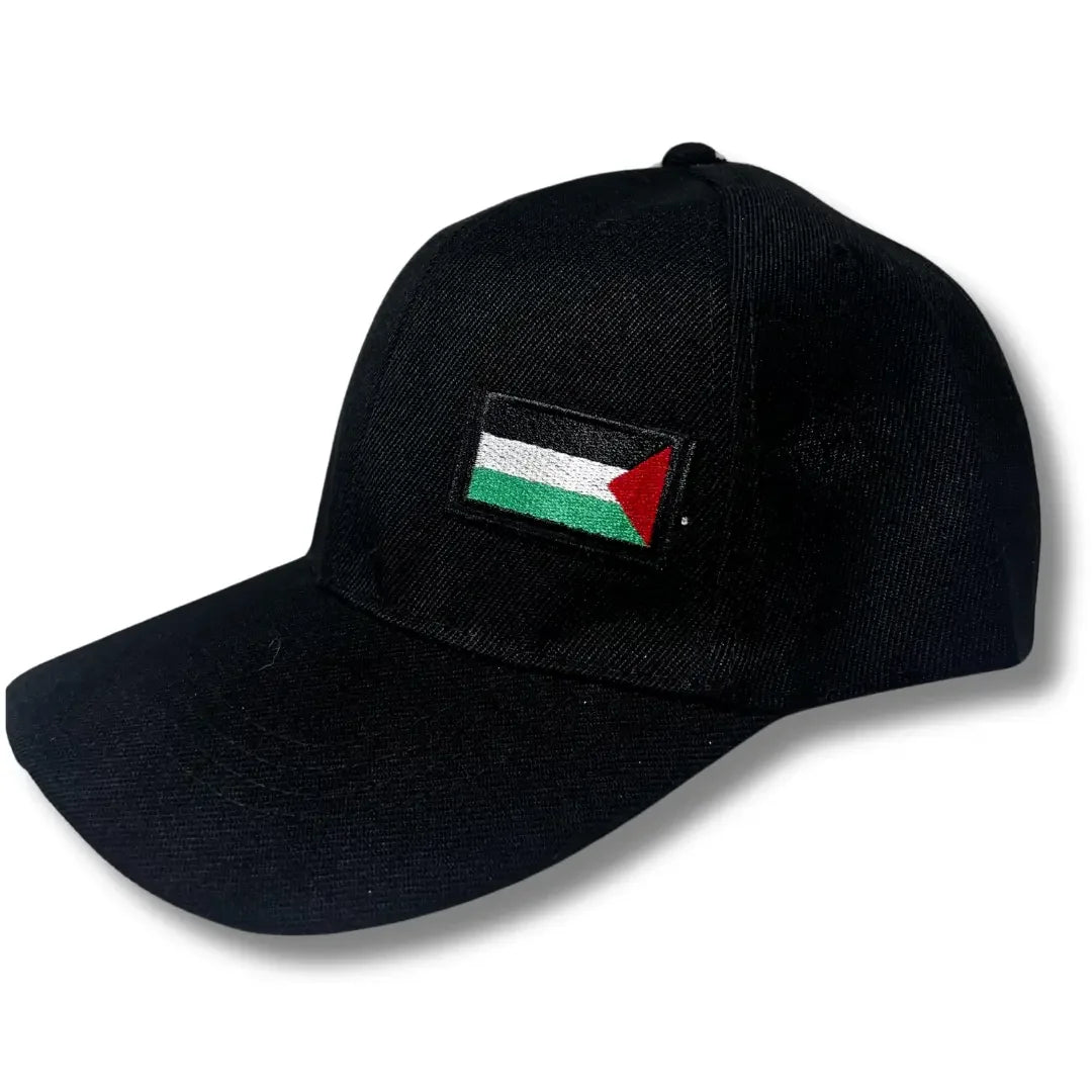 Black cap featuring Palestinian embroidered hat with flag patch from Palestinian Elegance