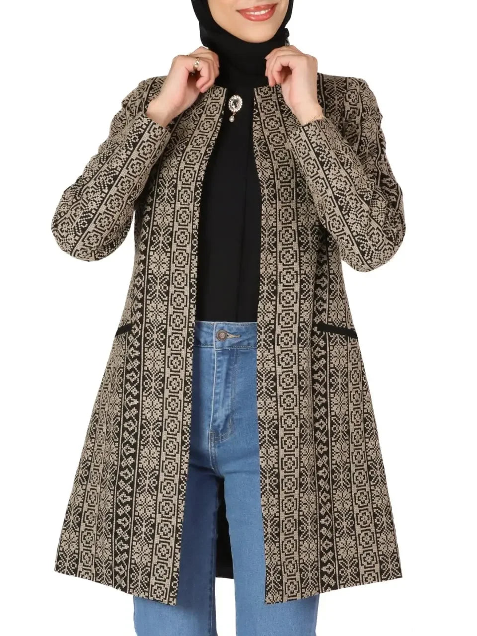 Palestinian embroidered jacket by Palestinian Elegance featuring traditional intricate black and beige embroidery