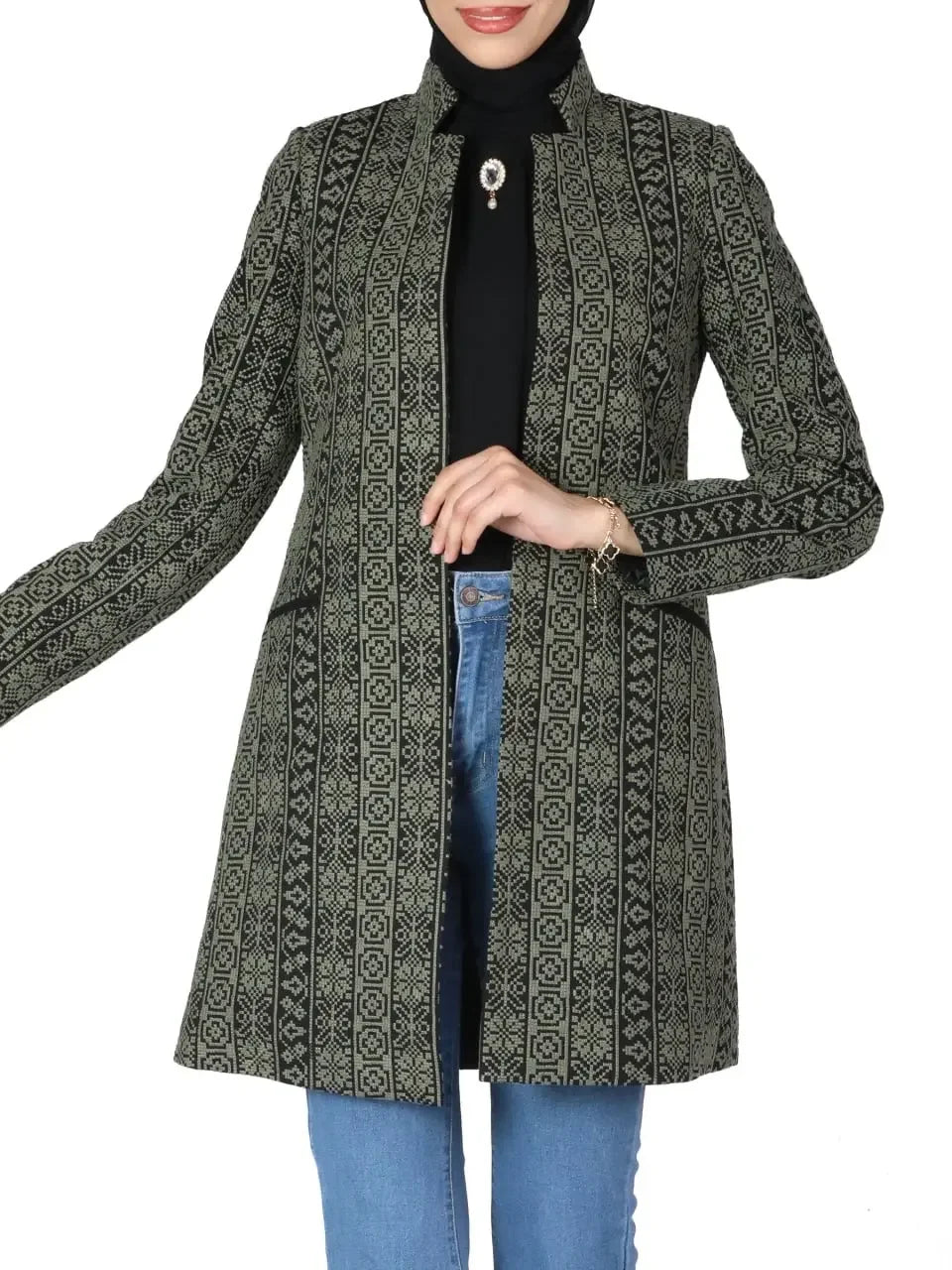Palestinian embroidered jacket by Palestinian Elegance with intricate traditional embroidery on a long coat