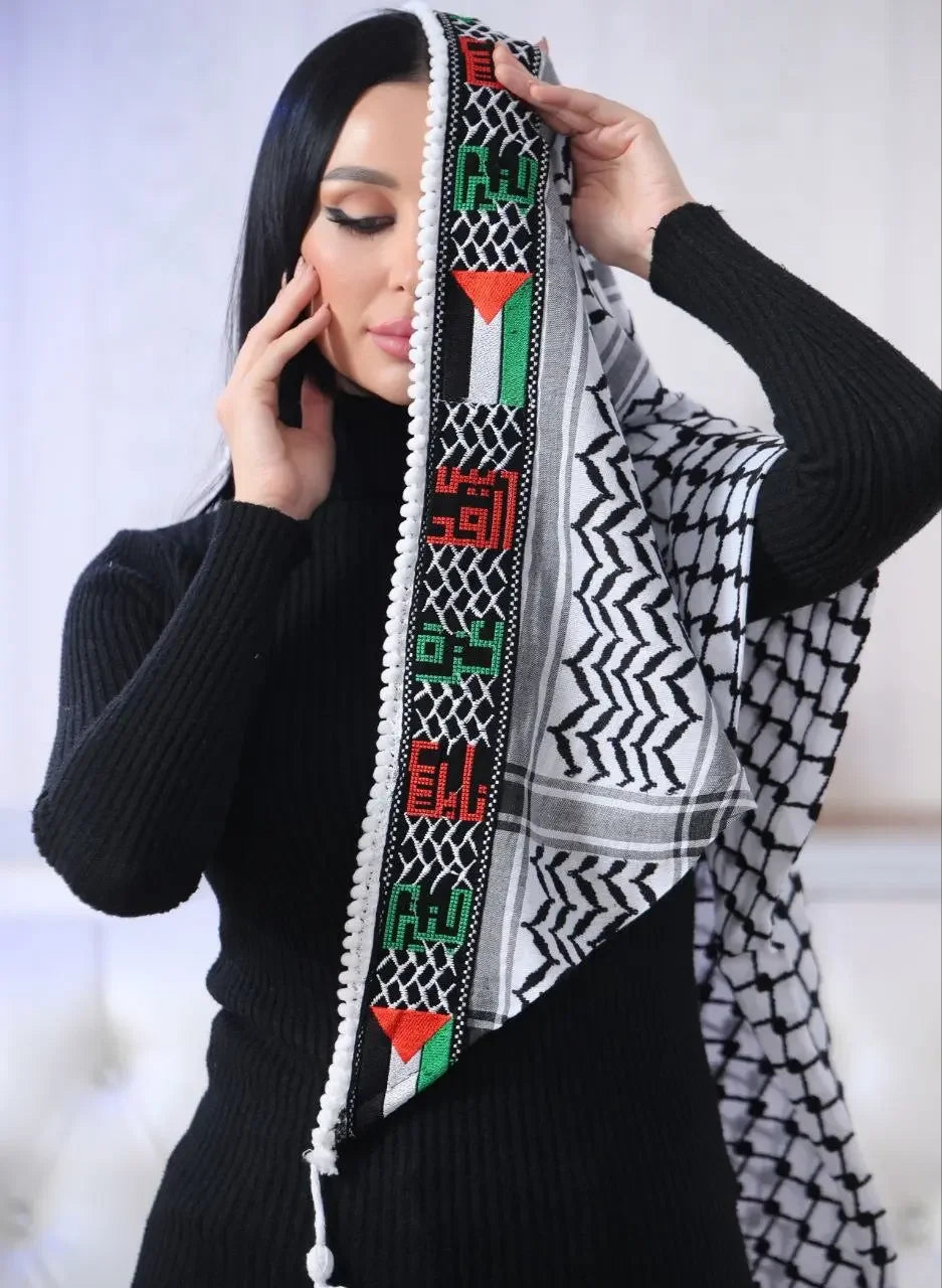 Palestinian Elegance black and white Palestinian embroidered kuffiyeh worn by woman with colorful stitching