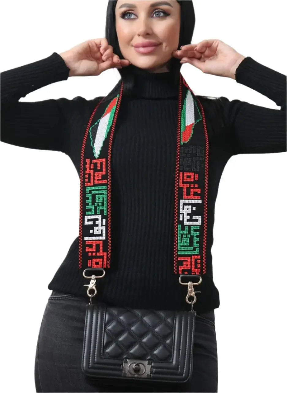 Palestinian Elegance woman wearing a black purse with a colorful Palestinian embroidered purse strap