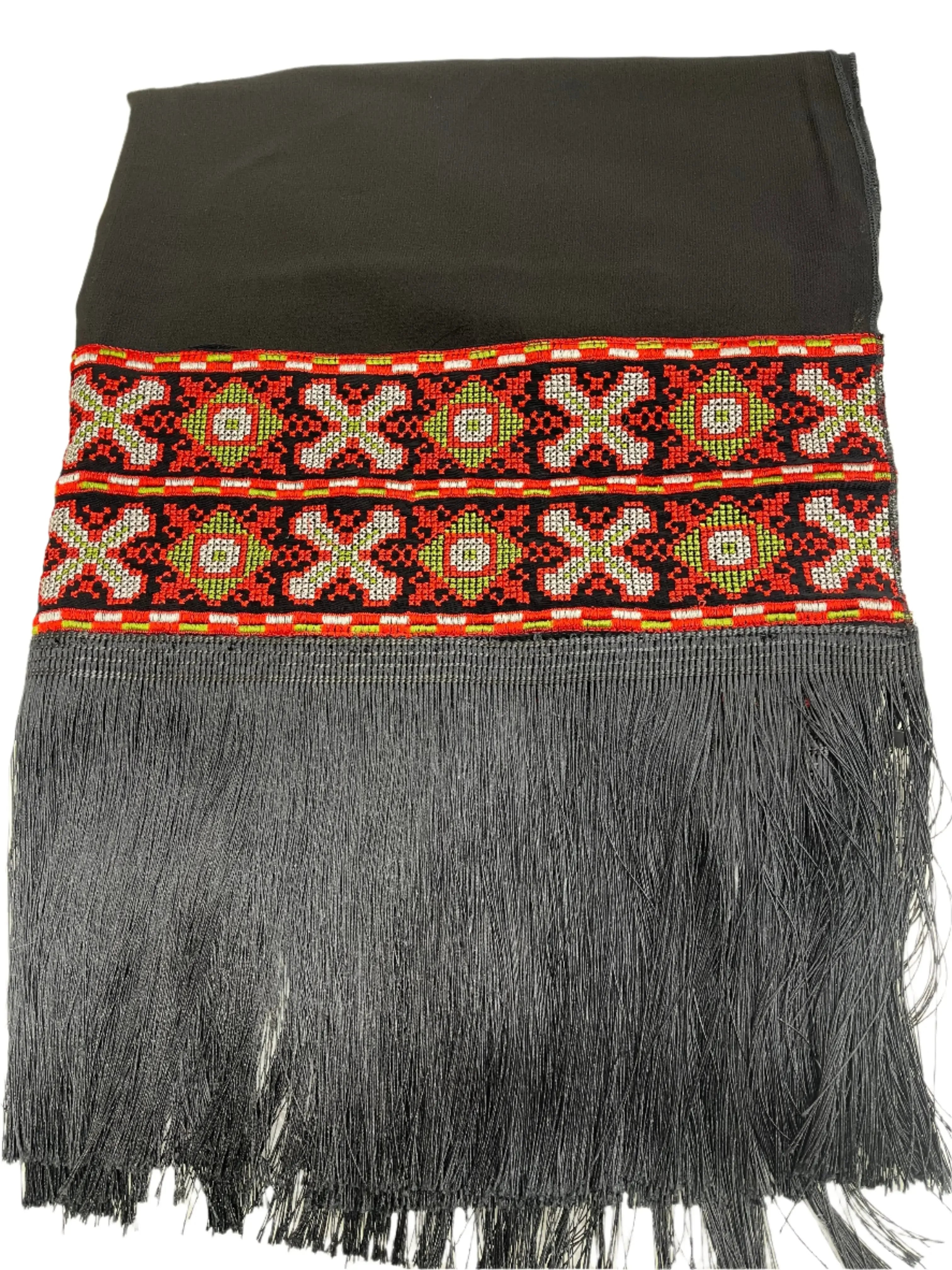 Palestinian embroidered shawl with intricate red and green embroidery and long gray fringes