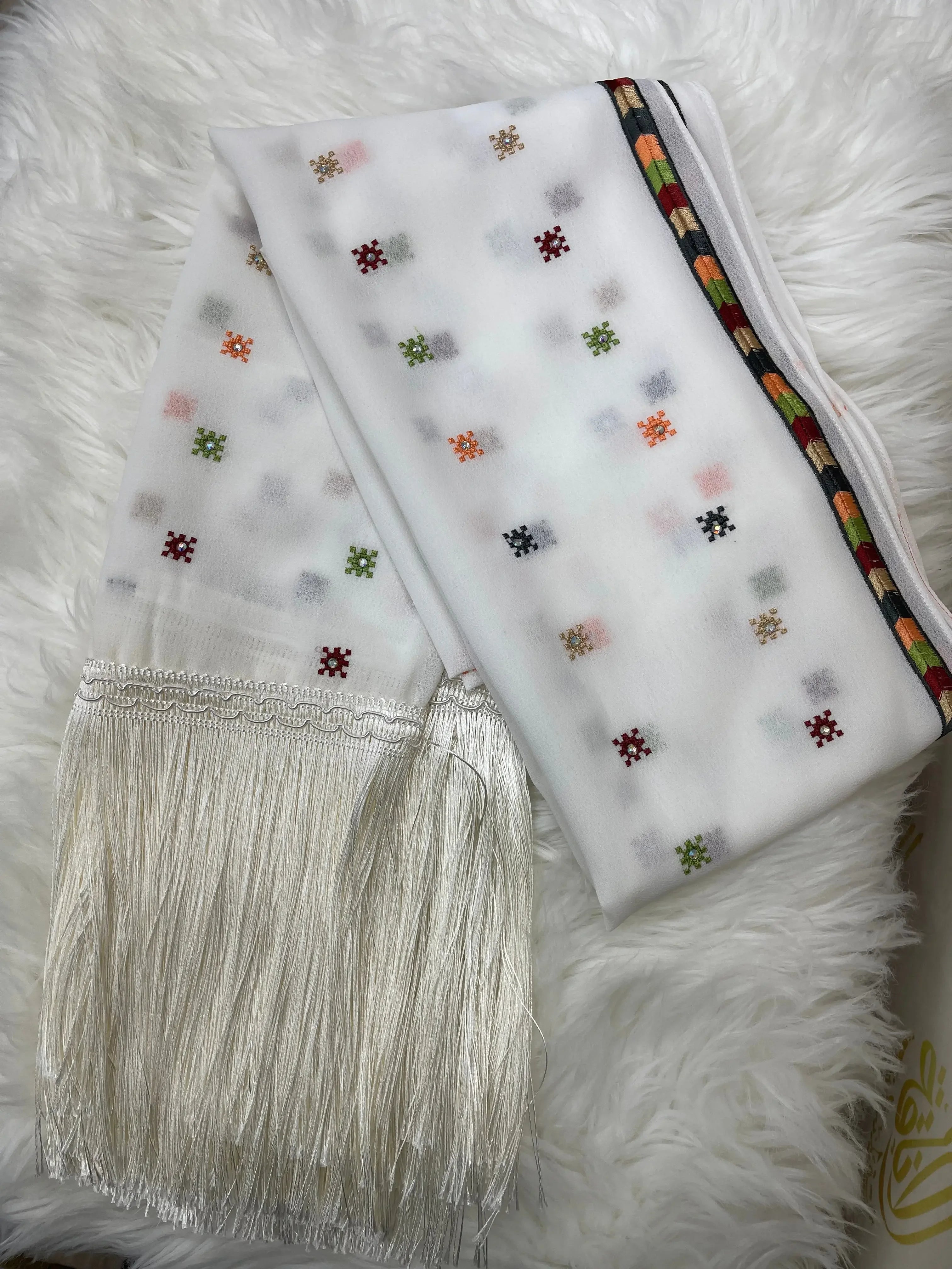 Palestinian embroidered shawl by Palestinian Elegance with colorful embroidery and white fringes