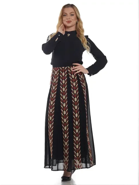 Palestinian embroidered skirt with traditional patterns worn with a black casual top by Palestinian Elegance
