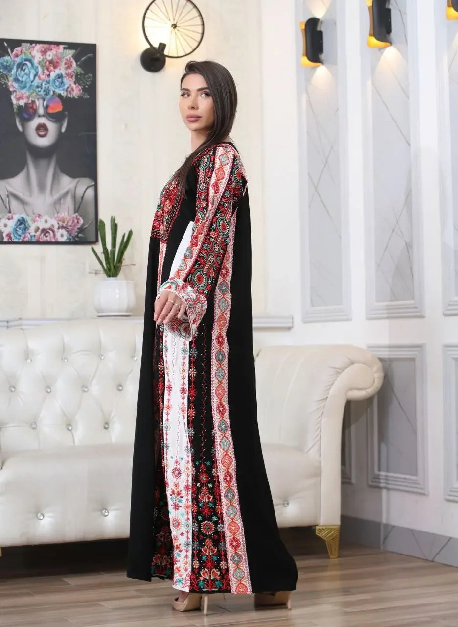Palestinian embroidered thobe by Palestinian Elegance with vibrant traditional red and black embroidery details