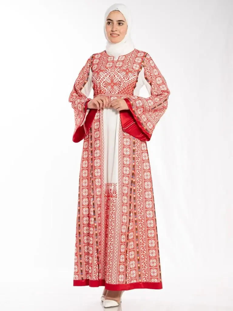 Palestinian embroidered thobe dress with red and white traditional embroidery worn with white hijab