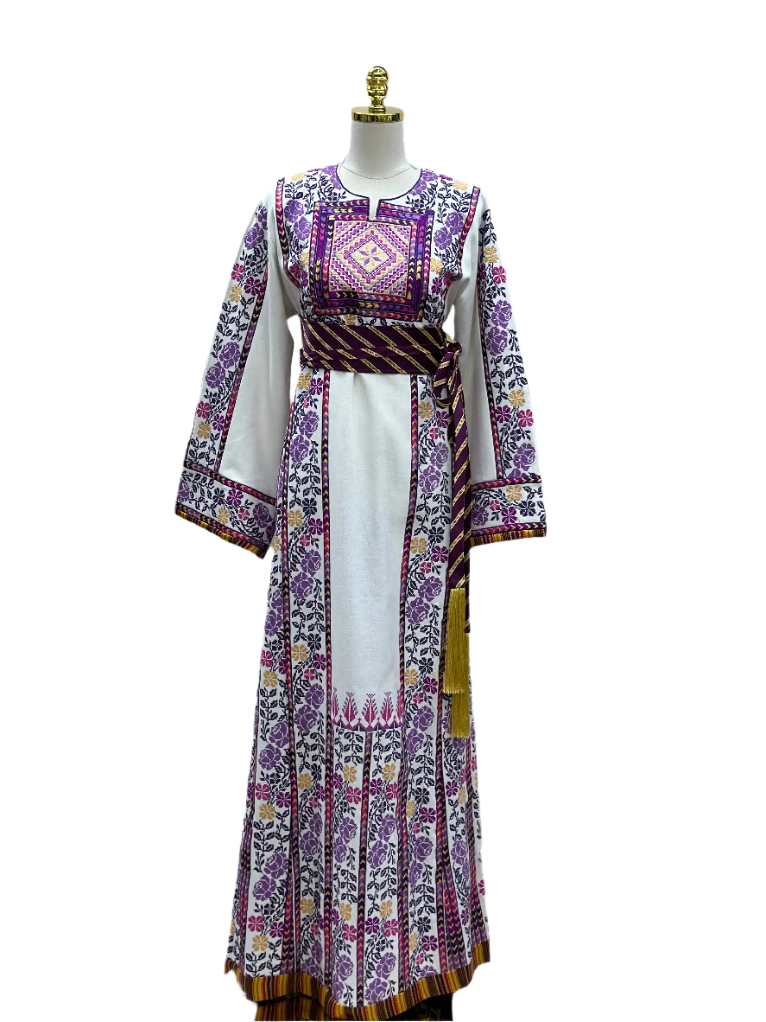 Palestinian embroidered thobe with intricate purple and pink floral designs and a striped sash belt
