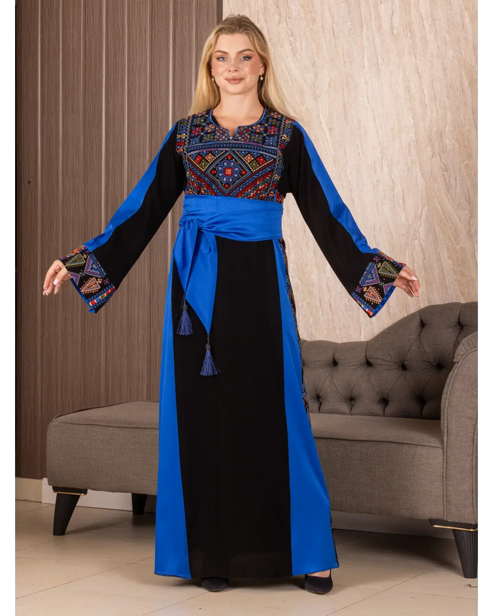 Palestinian embroidered thoub in black and blue with colorful traditional embroidery on chest and sleeves