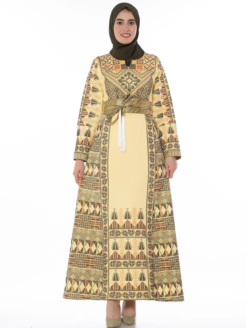 Palestinian embroidery dress by Palestinian Elegance featuring traditional geometric patterns on a long beige dress