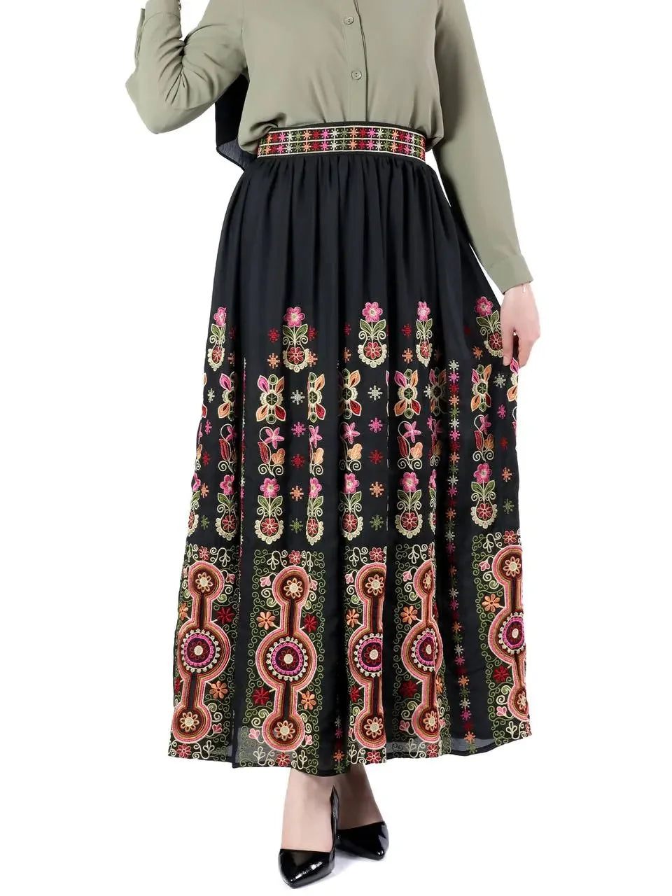 Palestinian embroidery skirt by Palestinian Elegance featuring colorful traditional floral patterns on a black fabric