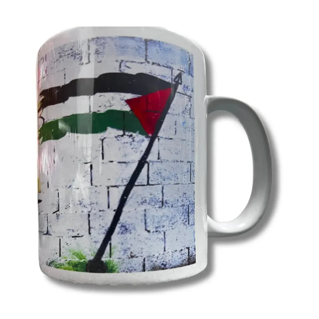 Palestinian flag coffee mug by Palestinian Elegance with graffiti style flag design on white ceramic