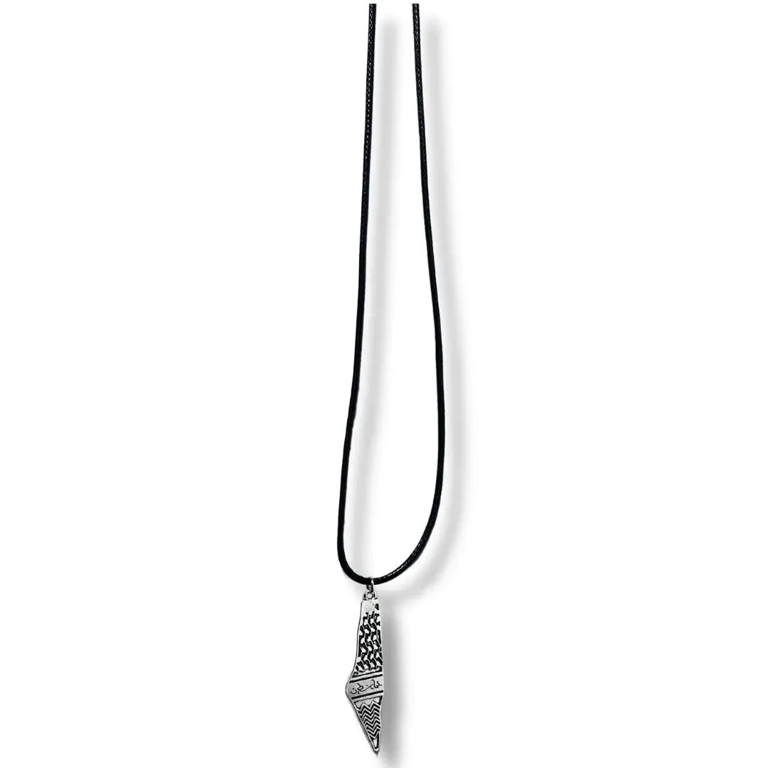 Palestinian kuffiyeh necklace with black cord and silver patterned pendant by Palestinian Elegance