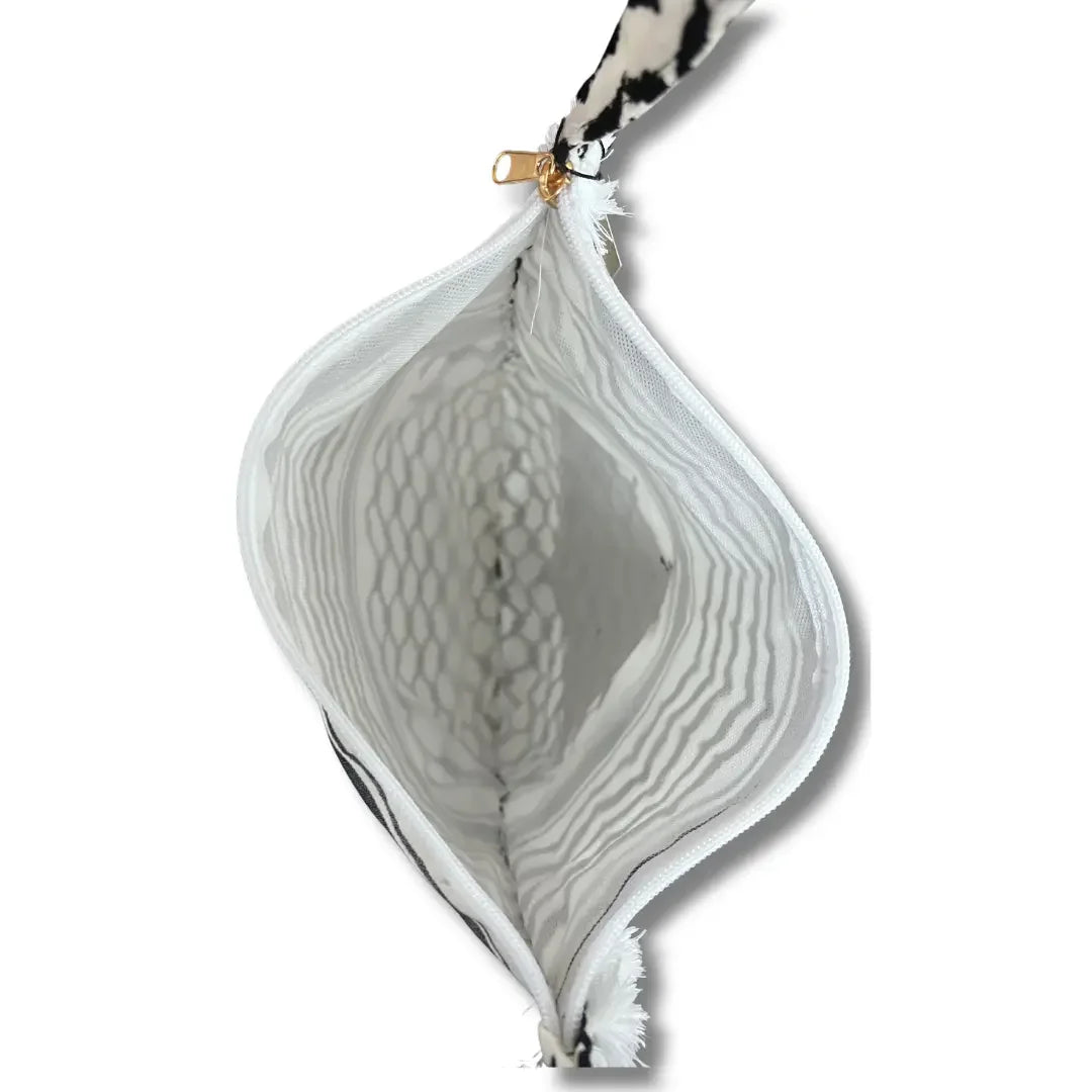 Open view of Palestinian kuffiyeh tote bag showing white patterned interior and zipper