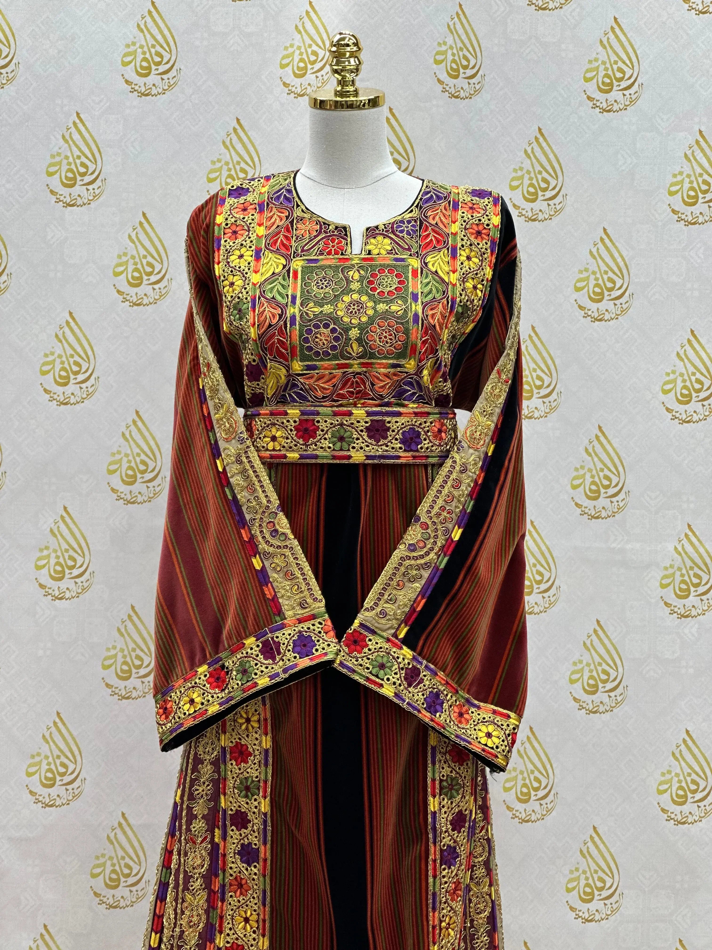 Palestinian Elegance embroidered Palestinian thoub dress with intricate colorful floral patterns and striped fabric