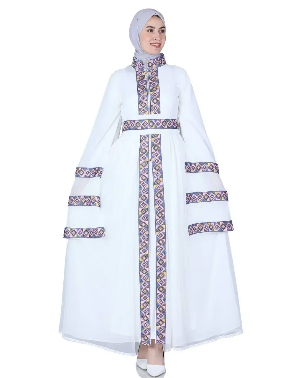 Palestinian Elegance luxury embroidered kaftan dress with intricate geometric patterns on white fabric