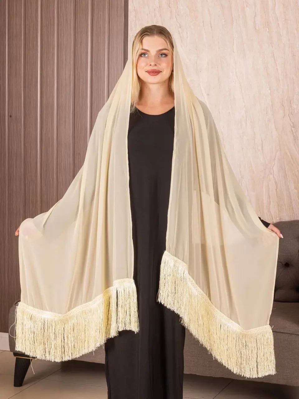 Palestinian Elegance traditional Palestinian khirka shawl in cream with fringe worn over black dress