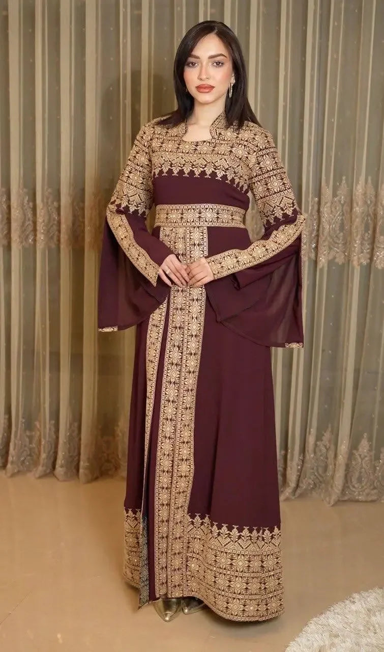 Palestinian Elegance tatreez dress for women in deep burgundy with intricate beige embroidery and long flowing sleeves