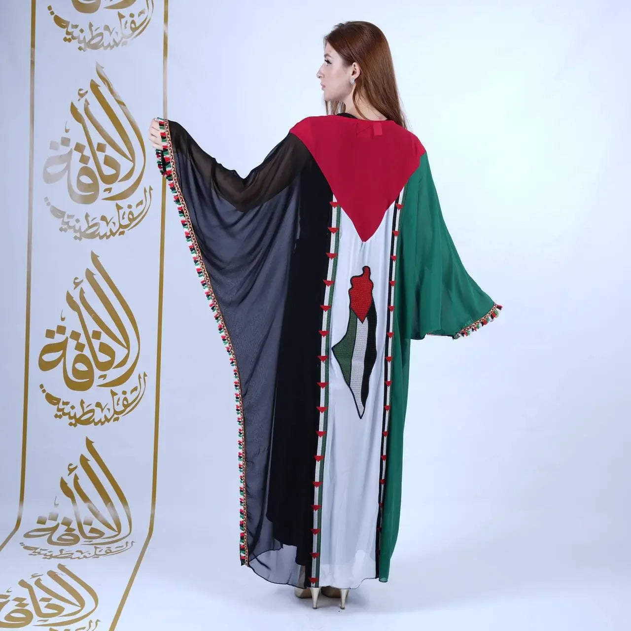 Palestinian Elegance casual Palestinian flag dress with black, white, green, and red colors worn by a woman