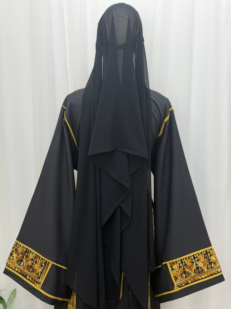 Thobe Al-Kanz Al-Dhahabi (The Golden Treasure Thobe)