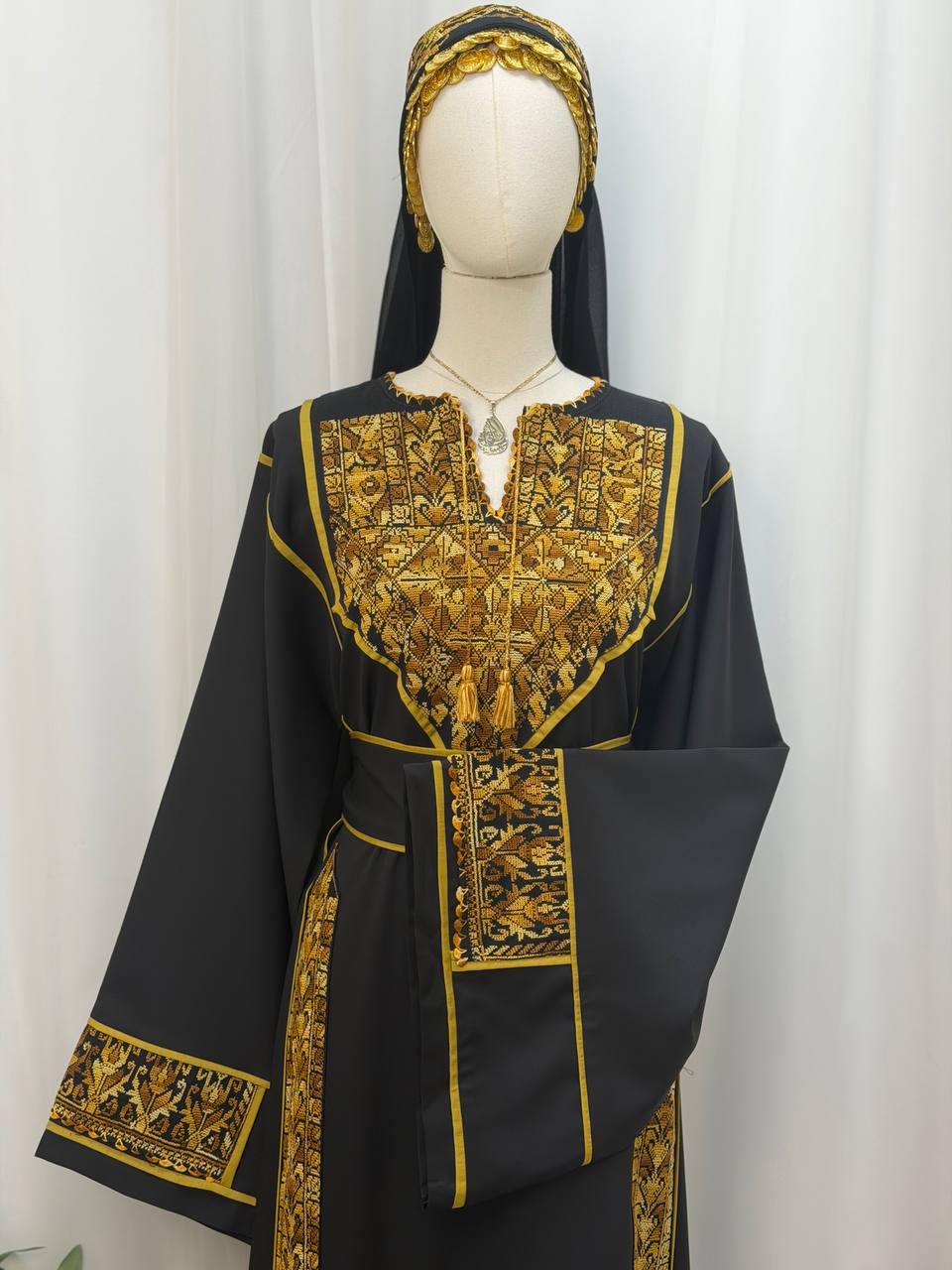 Thobe Al-Kanz Al-Dhahabi (The Golden Treasure Thobe)