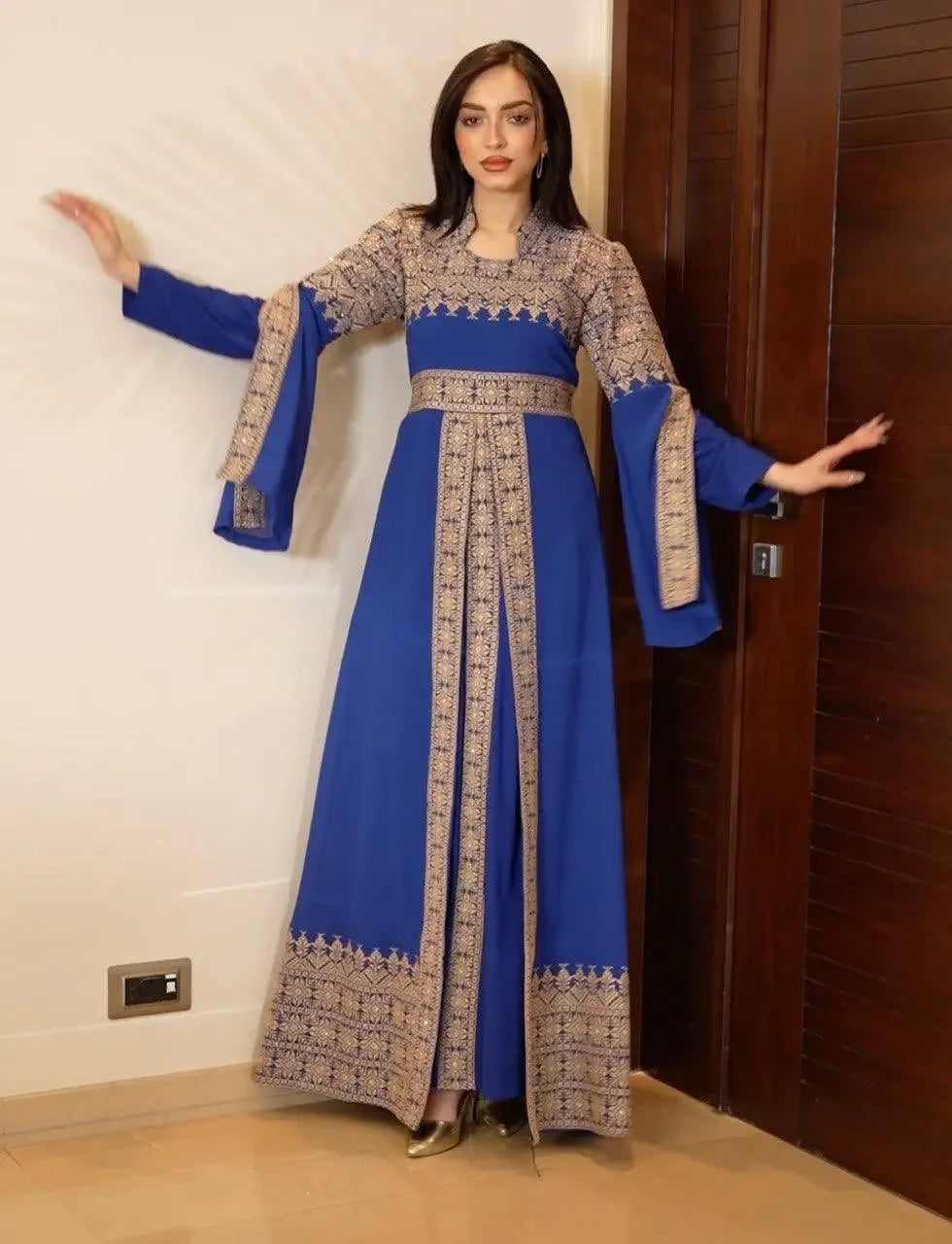 Blue tatreez dress for women with traditional Palestinian embroidery and long sleeves
