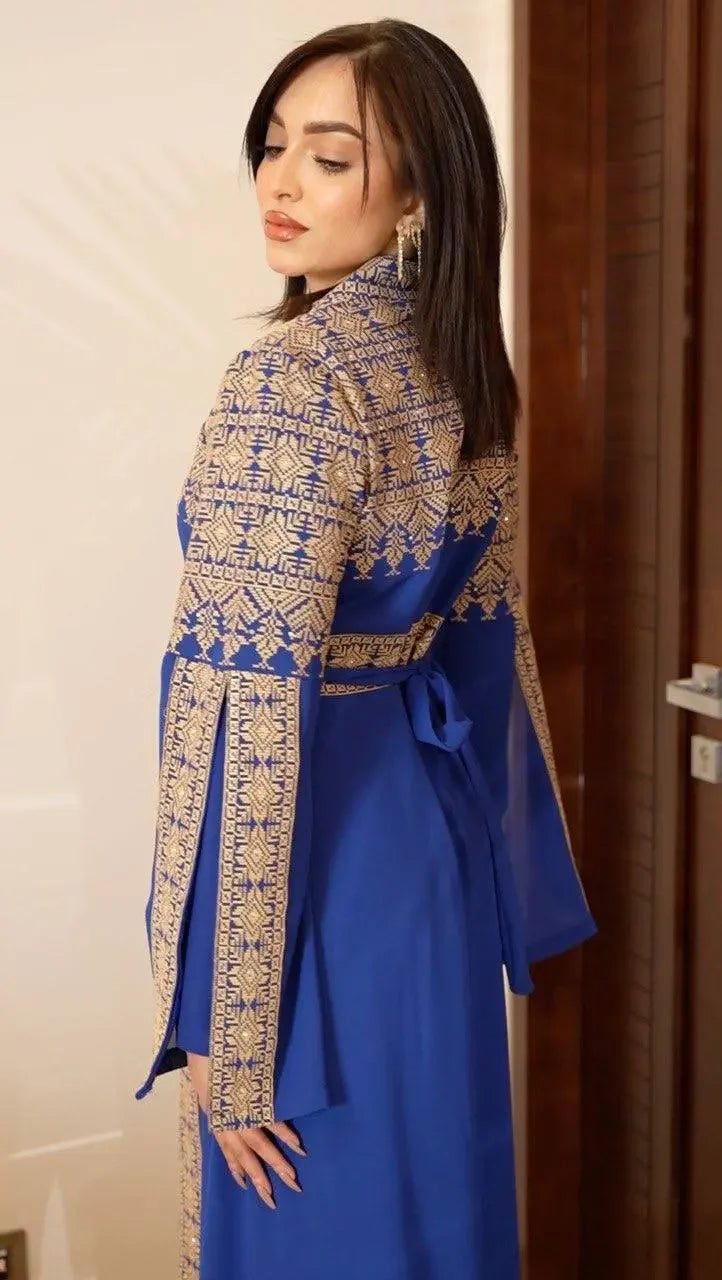 Palestinian Elegance blue tatreez dress for women with intricate gold embroidery and long sleeves