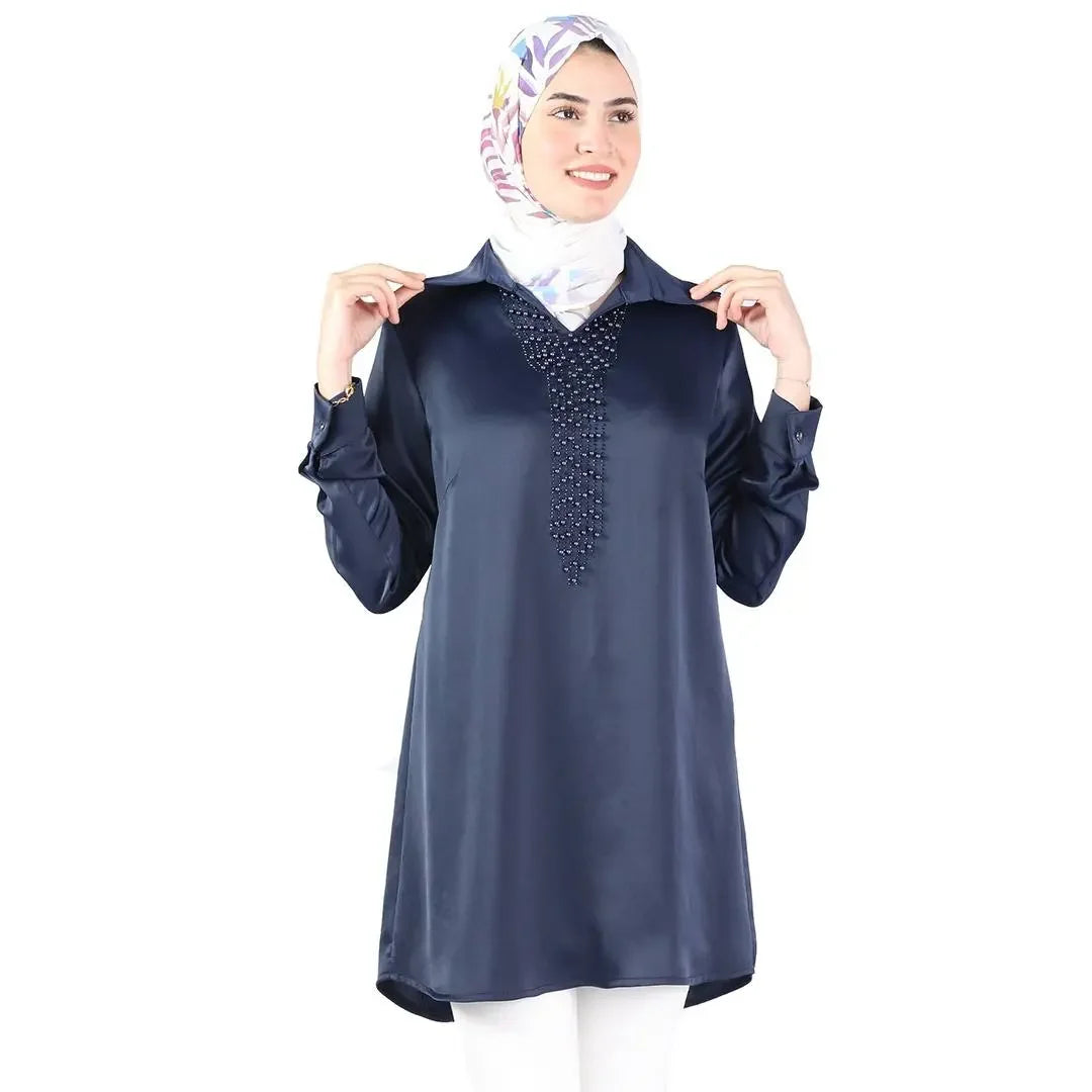 Palestinian Elegance navy satin pearl shirt for women with long sleeves and collar styled with floral hijab