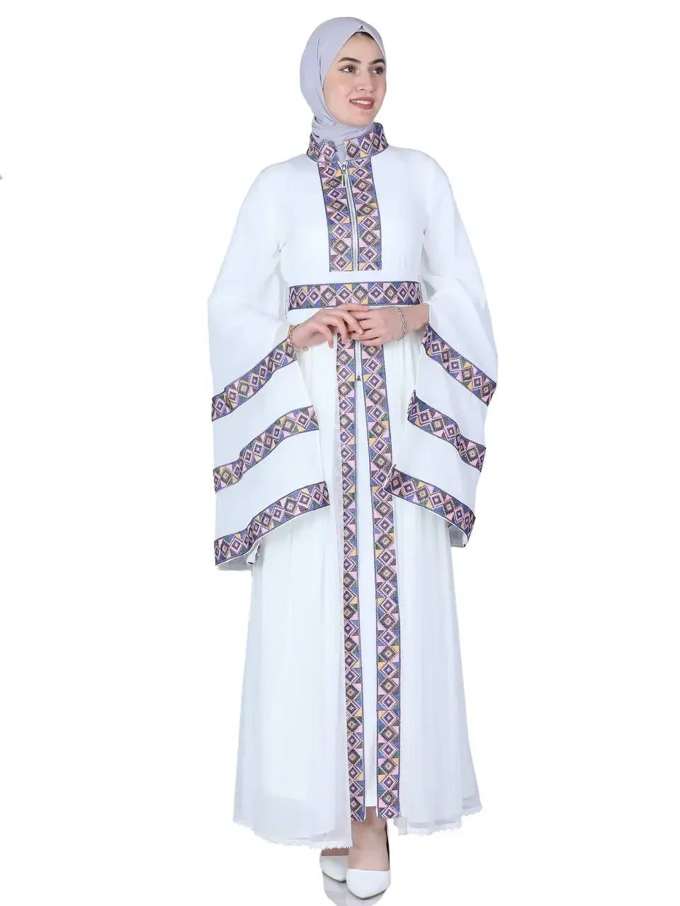 White luxury embroidered kaftan dress with geometric patterns from Palestinian Elegance
