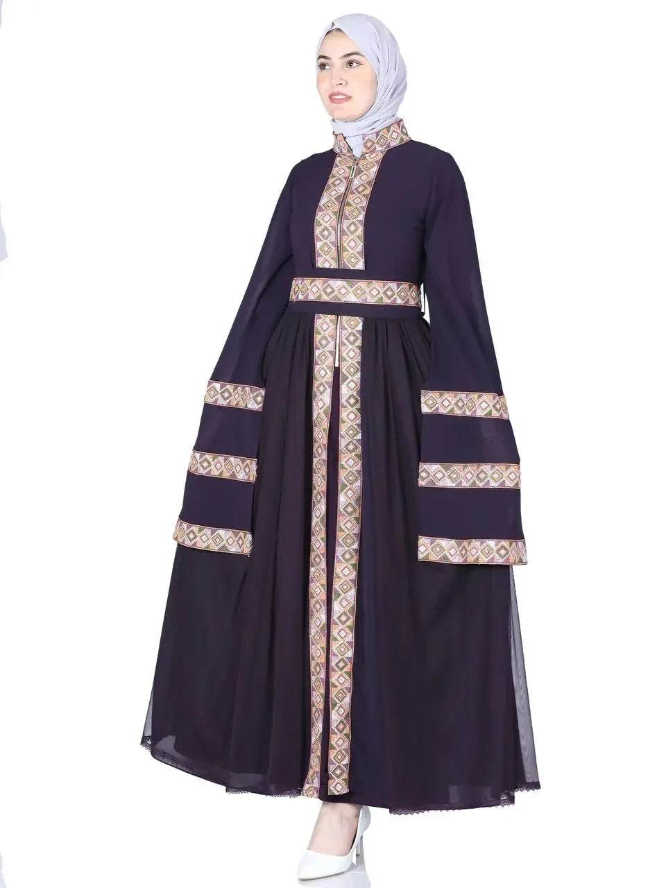 Palestinian Elegance luxury embroidered kaftan dress in dark purple with detailed geometric embroidery and wide sleeves
