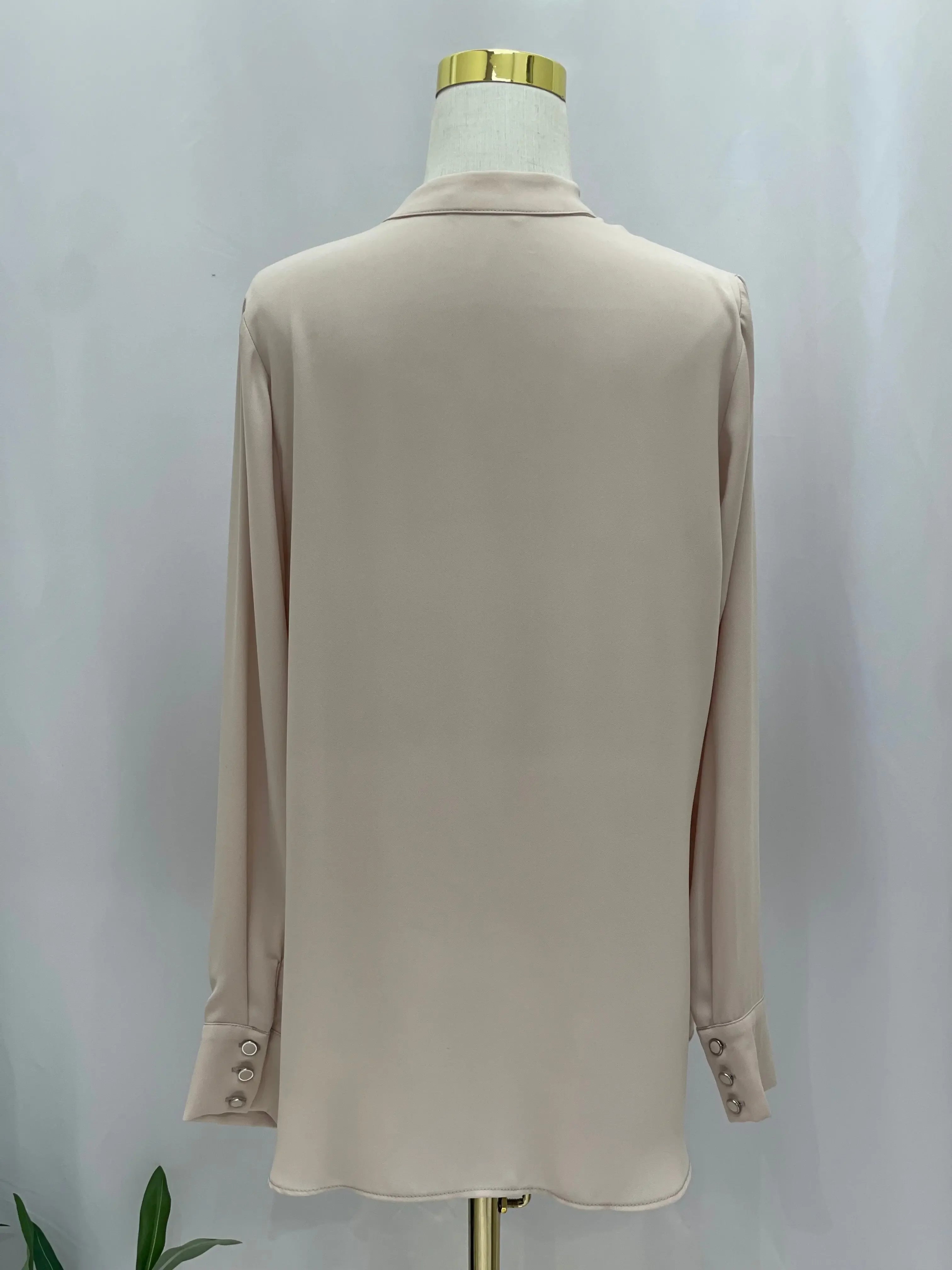 Timeless Elegance: The Expertly Designed Pleated Blouse Palestinian Elegance