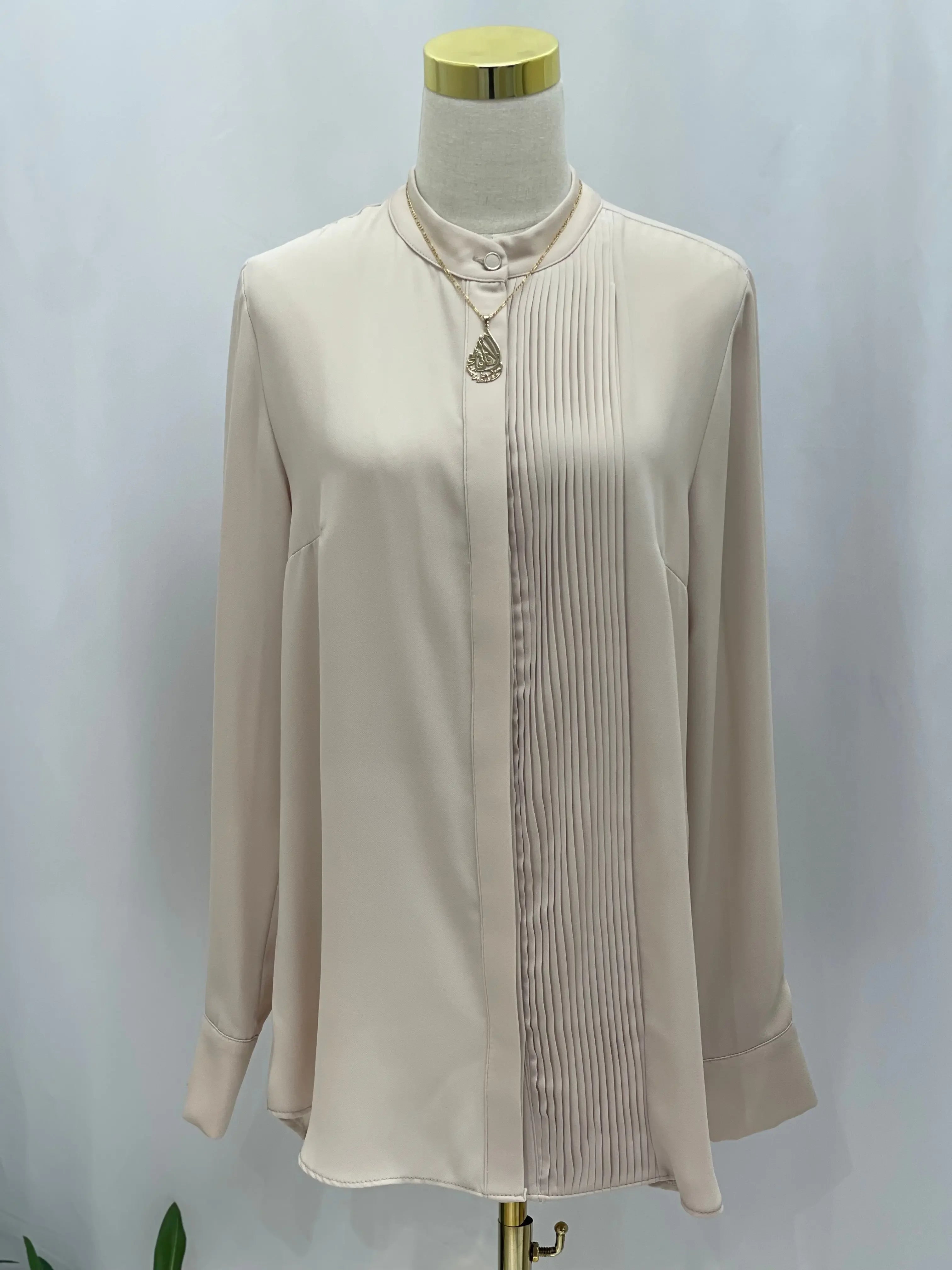 Timeless Elegance: The Expertly Designed Pleated Blouse Palestinian Elegance