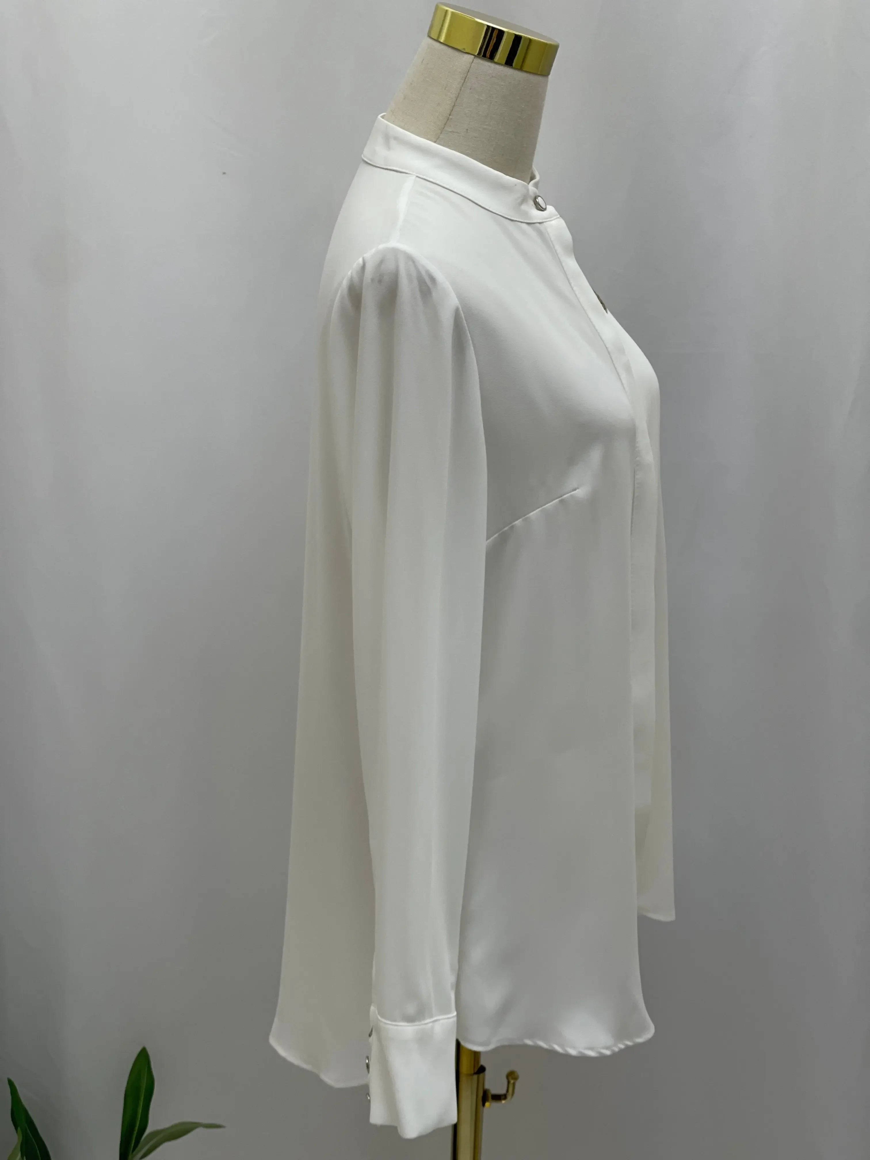 Timeless Elegance: The Expertly Designed Pleated Blouse Palestinian Elegance