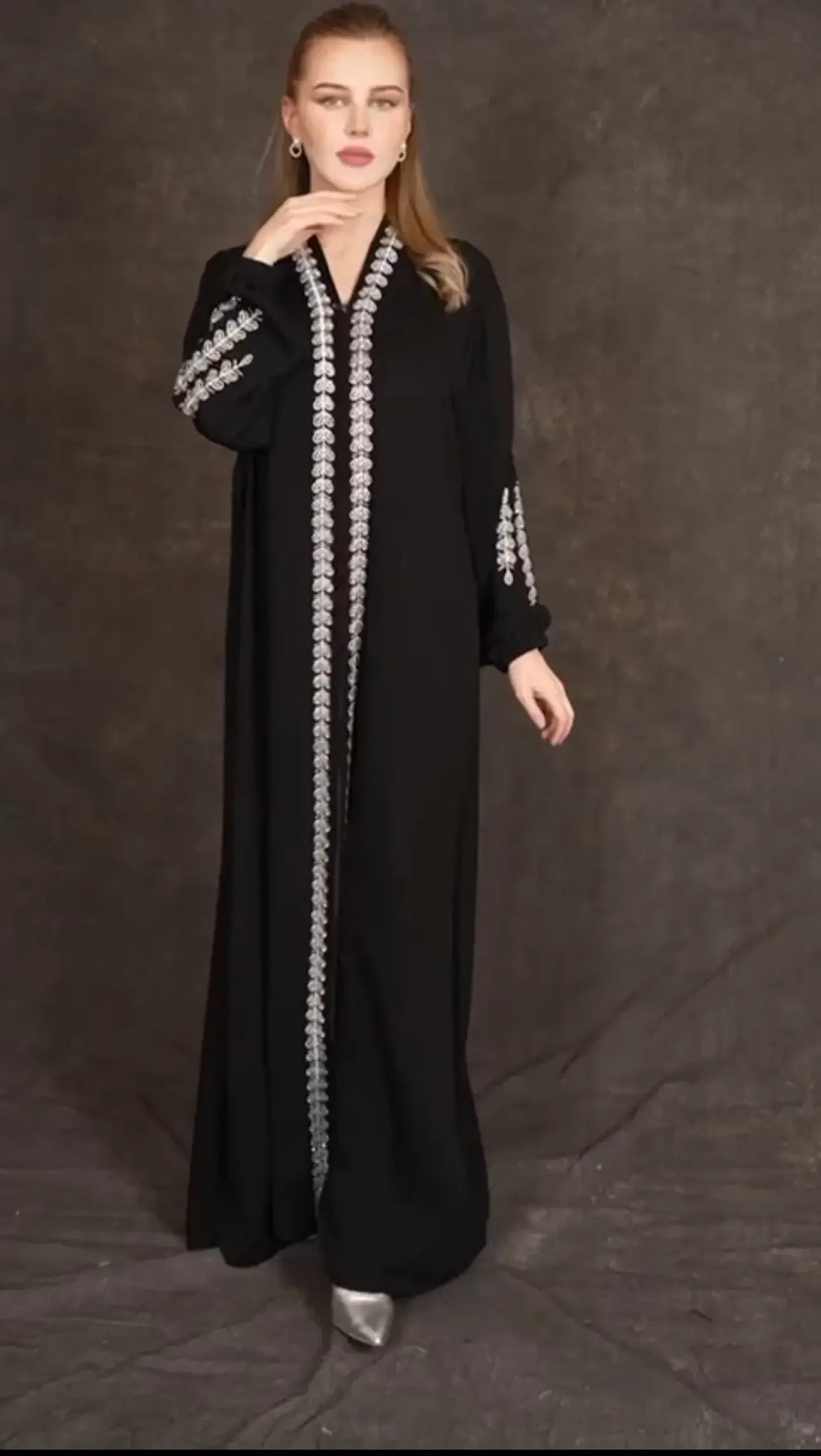 Palestinian Elegance plus size embroidered abaya in black with silver detailed embroidery on sleeves and front