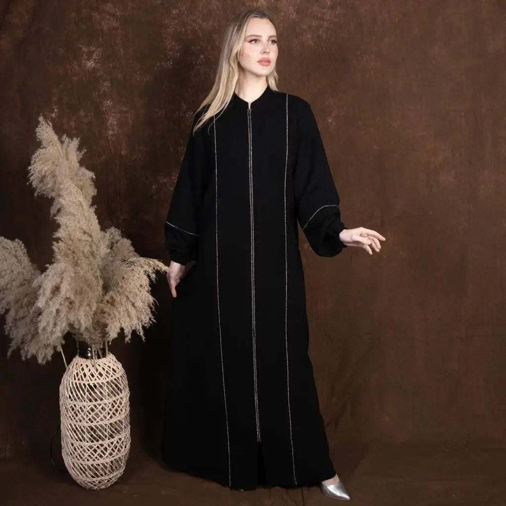 Palestinian Elegance plus size embroidered abaya in black with full front zipper and balloon sleeves