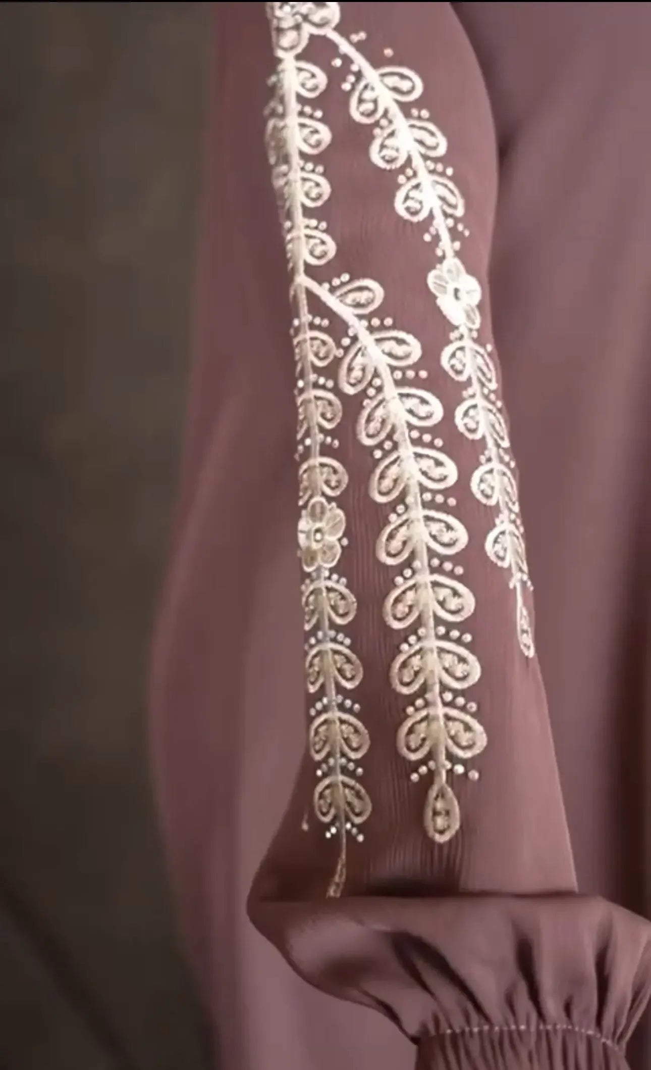 Plus size embroidered abaya sleeve with intricate white floral embroidery on brown fabric by Palestinian Elegance