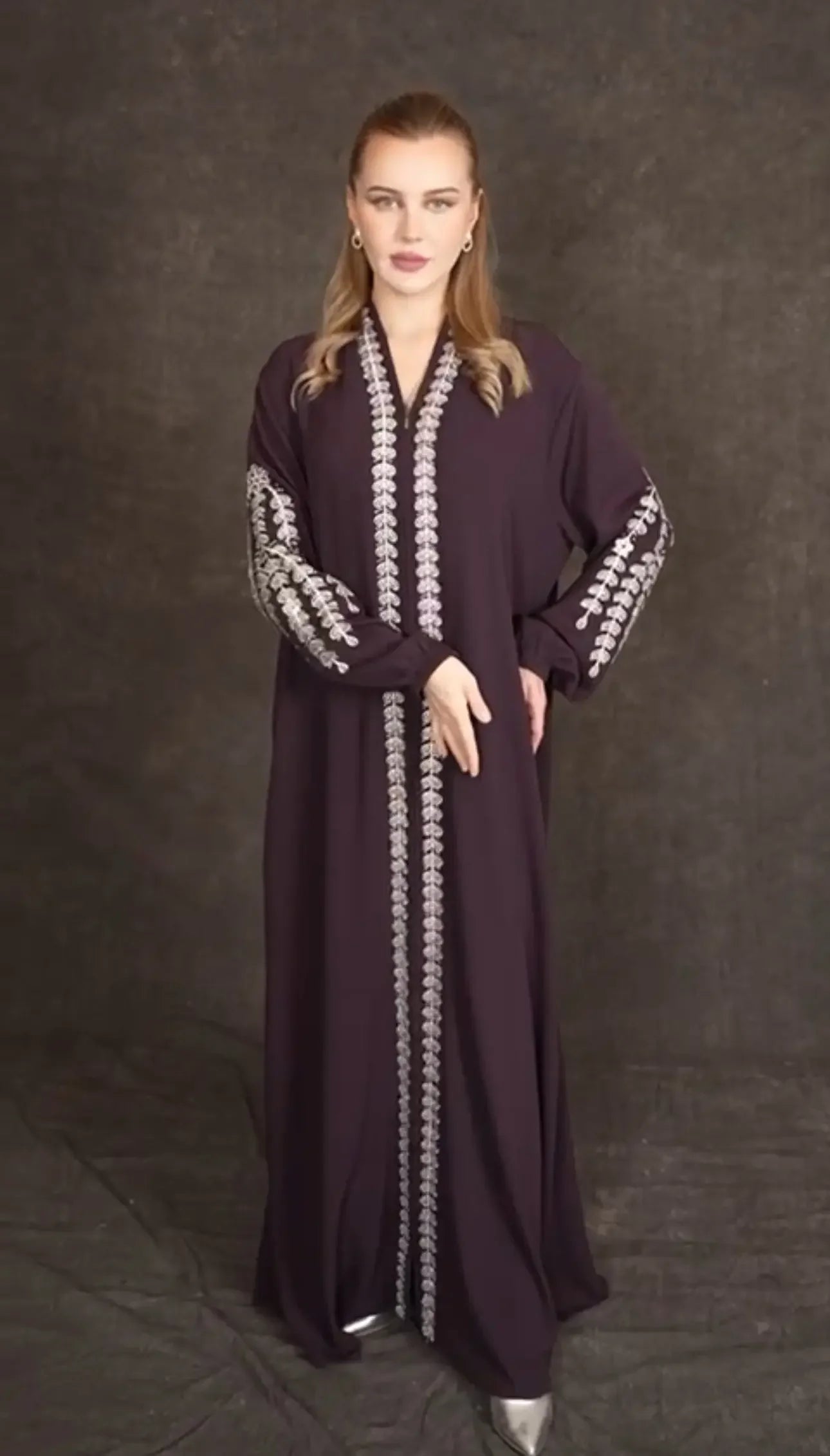 Plus size embroidered abaya in dark purple with white floral embroidery on sleeves and front panel