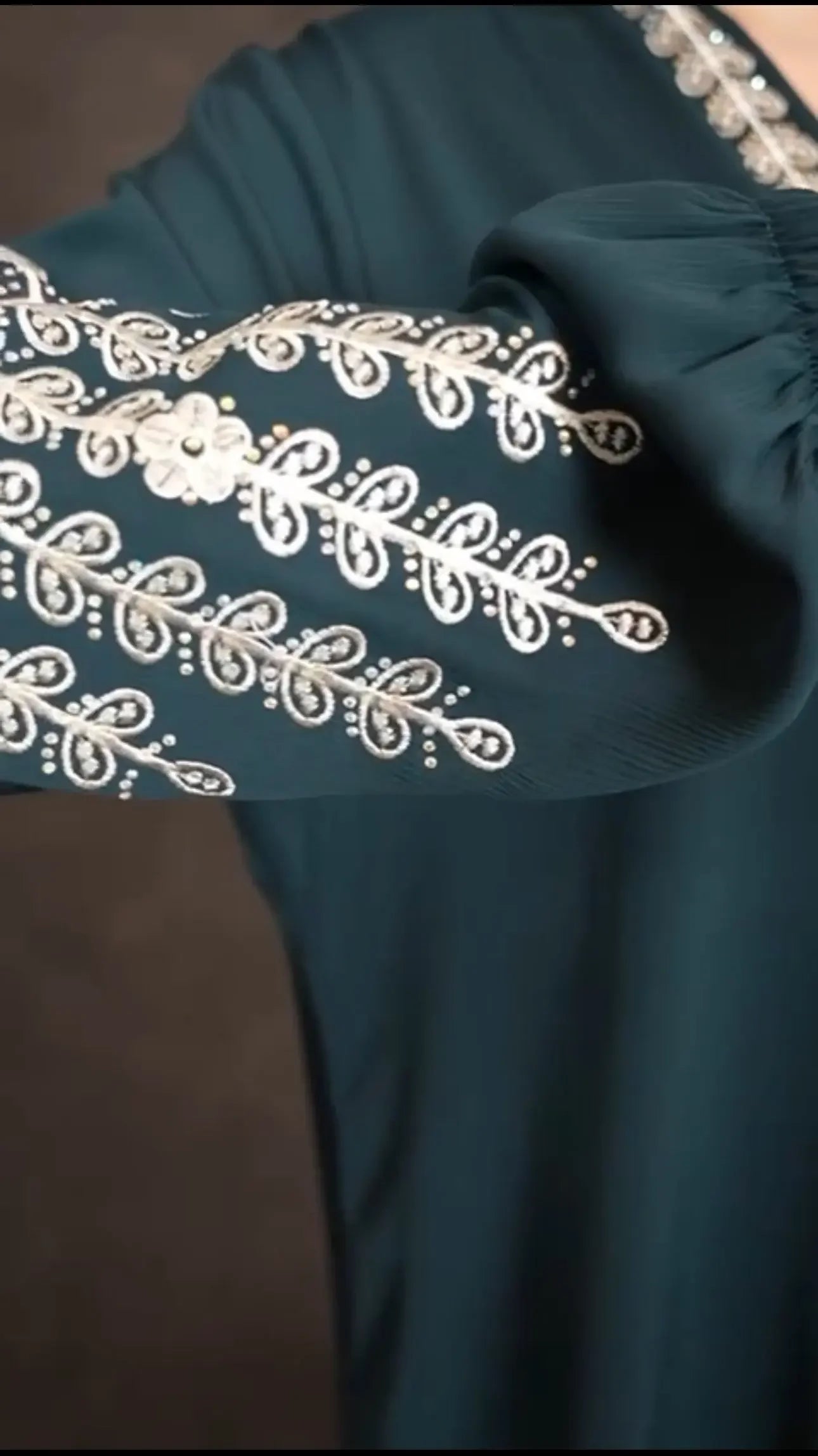 Plus size embroidered abaya sleeve featuring intricate white floral embroidery by Palestinian Elegance