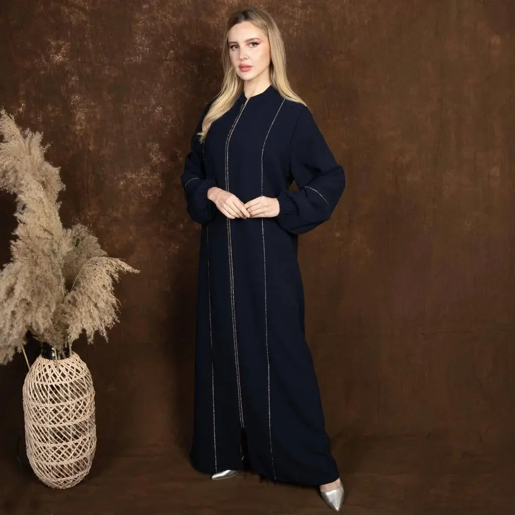 Palestinian Elegance plus size embroidered abaya in black with long sleeves and detailed stitching