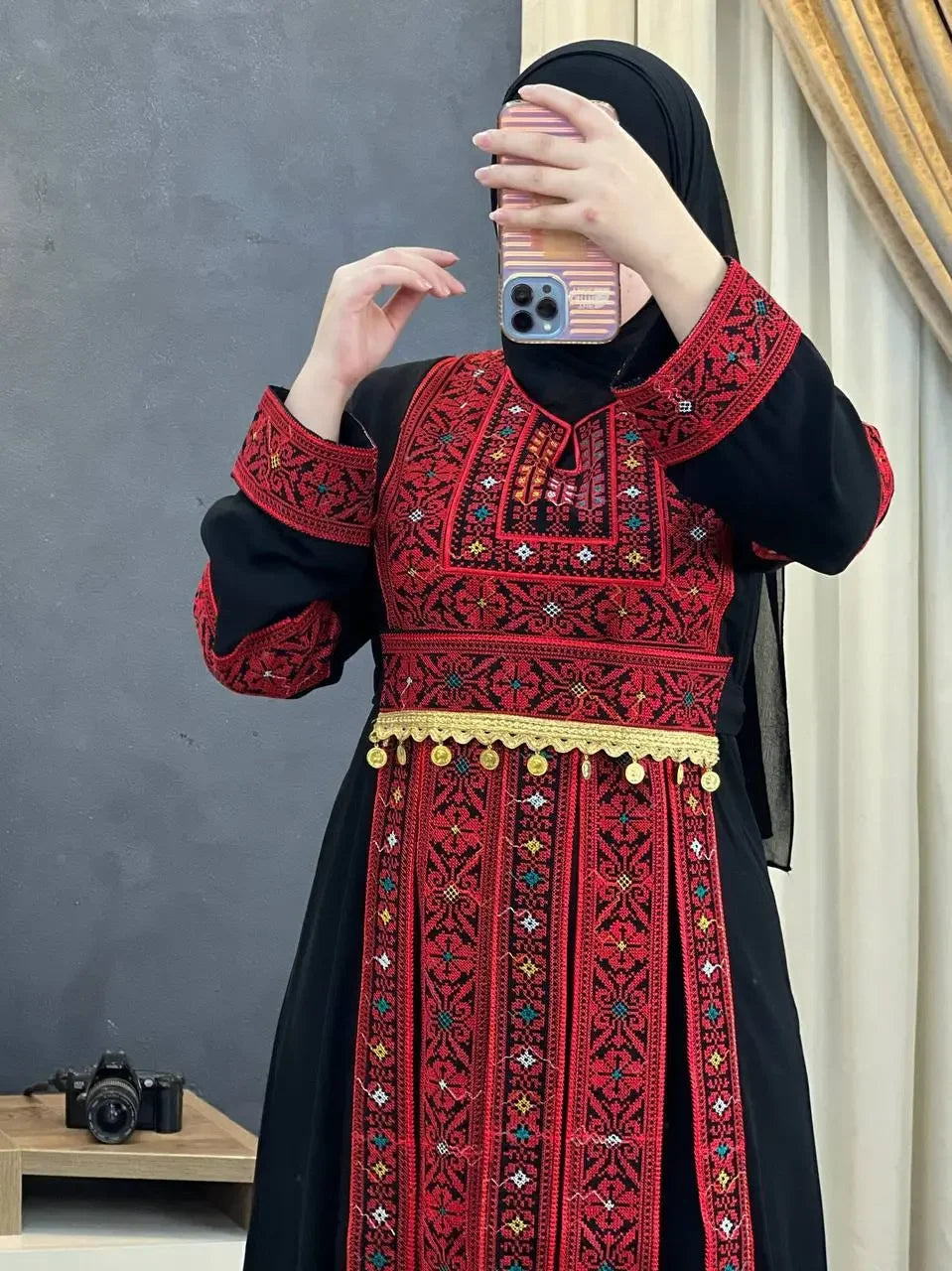 Palestinian Elegance red tatreez abaya with intricate embroidery and decorative gold detailing