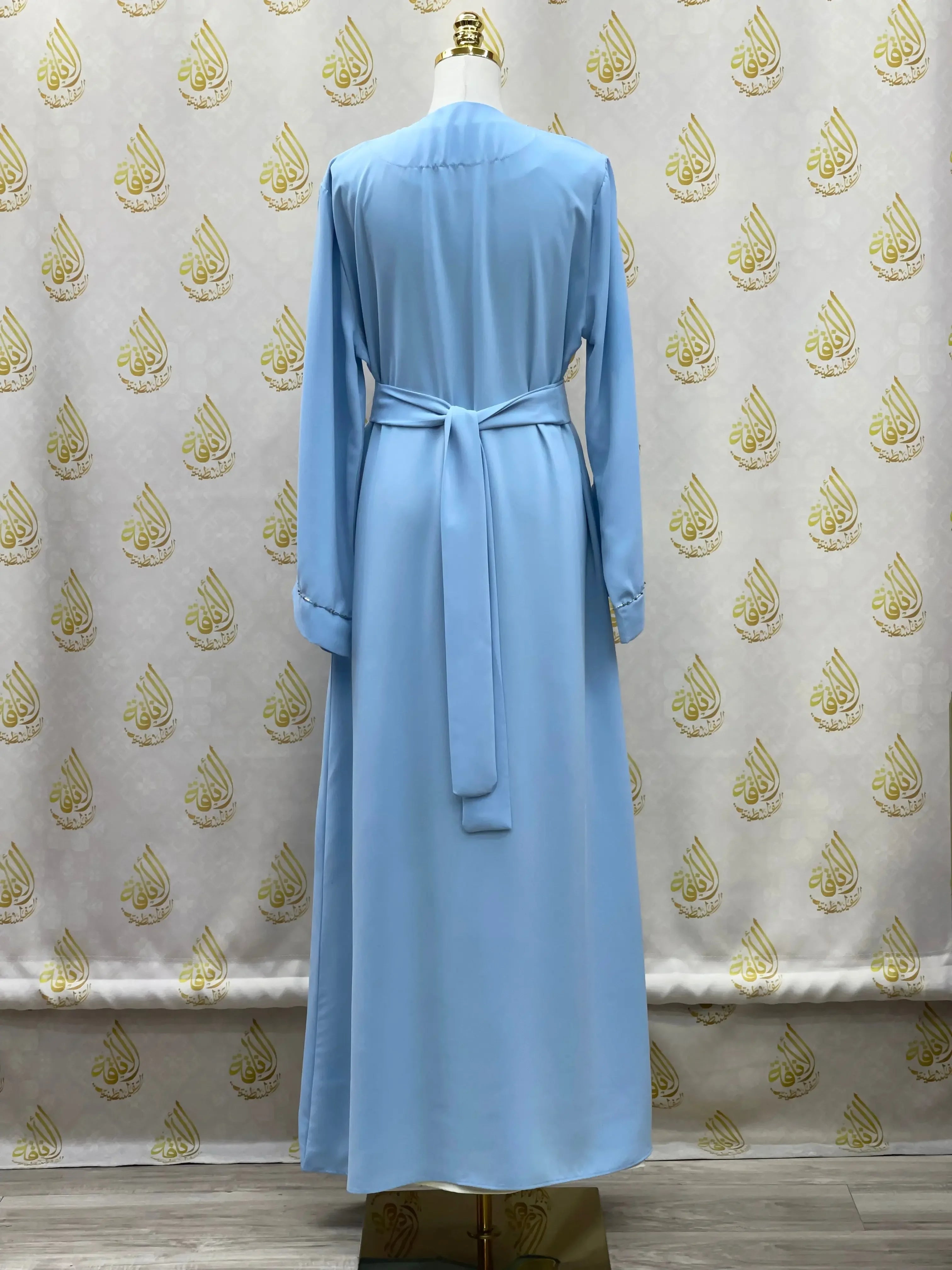 Palestinian Elegance light blue rhinestone moroccan abaya with long sleeves and waist tie belt back view